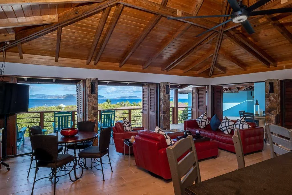 Open kitchen and living room at Eden Waters Villa in Little Trunk Bay