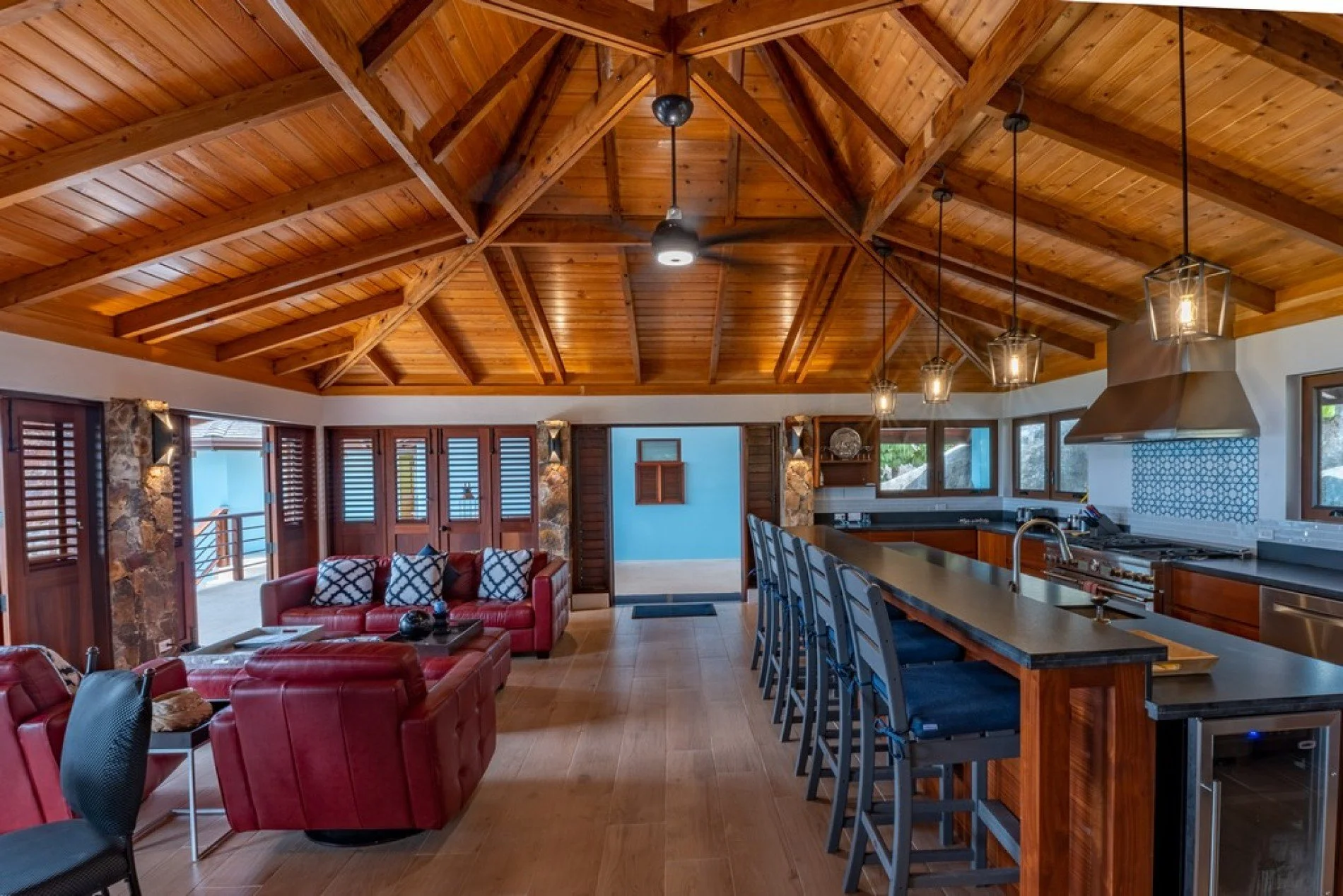Open kitchen and living room at Eden Waters Villa in Little Trunk Bay