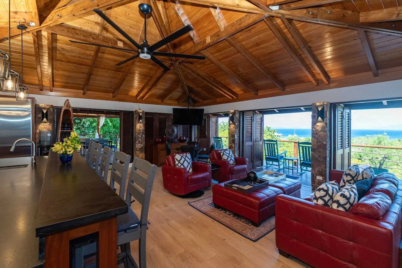 Open kitchen and living room at Eden Waters Villa in Little Trunk Bay