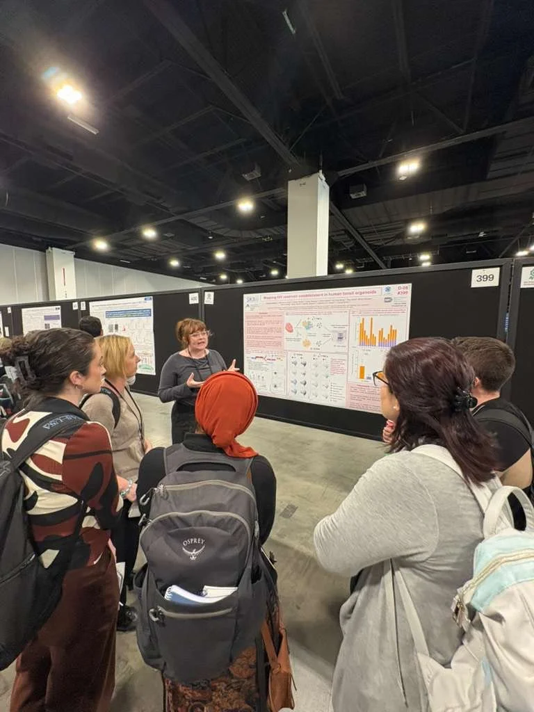 Lotte at Poster with Group CROI 2026.jpeg