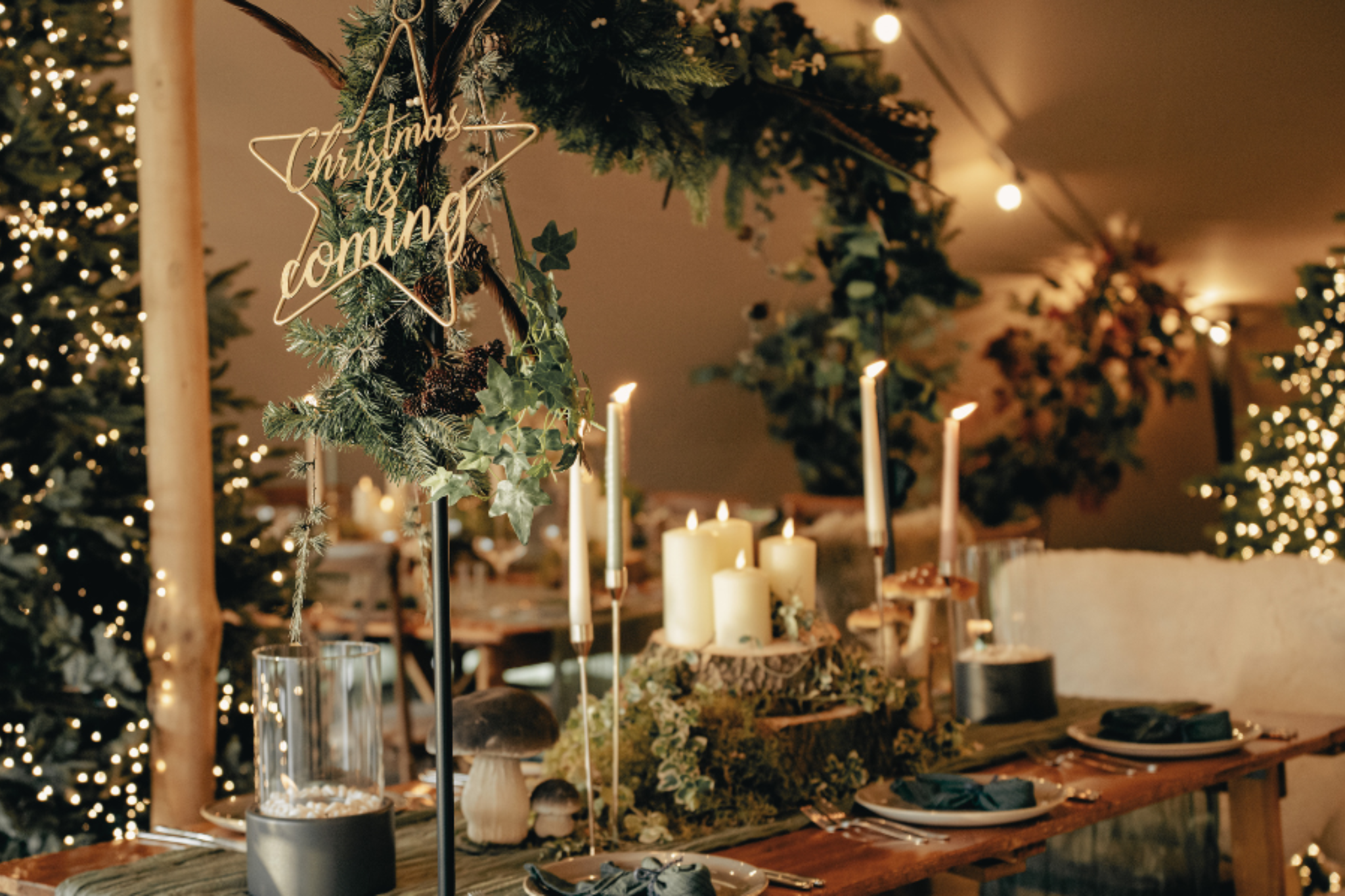 Enchanted Glade Office Christmas Party tabel with mmersive green foliage.png