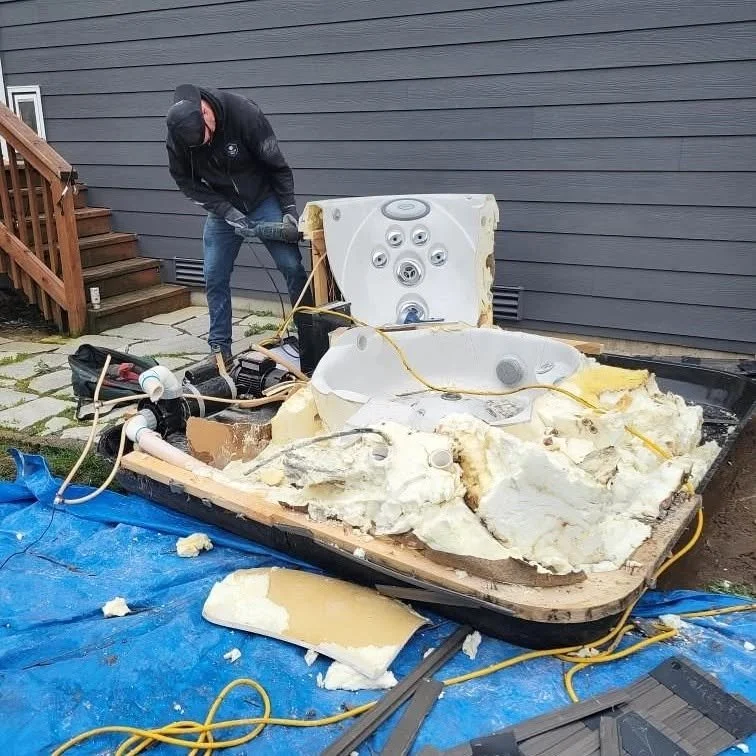 Yetter's Junk Removal Disassembling a broken hot tub in Port Orchard