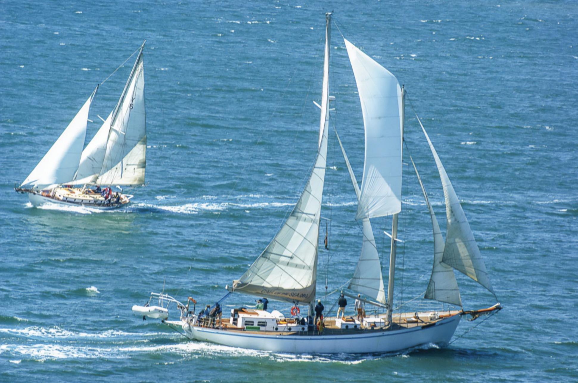 SCOOTIN' SCHOONERS: The schooner Wiletie (left) makes the turn to chase Call of the Sea’s Seaward, raced by San Francisco Yacht Club members Alan Olson and Michael Seaman, who ultimately took first place in the Schooner division of the club’s annual