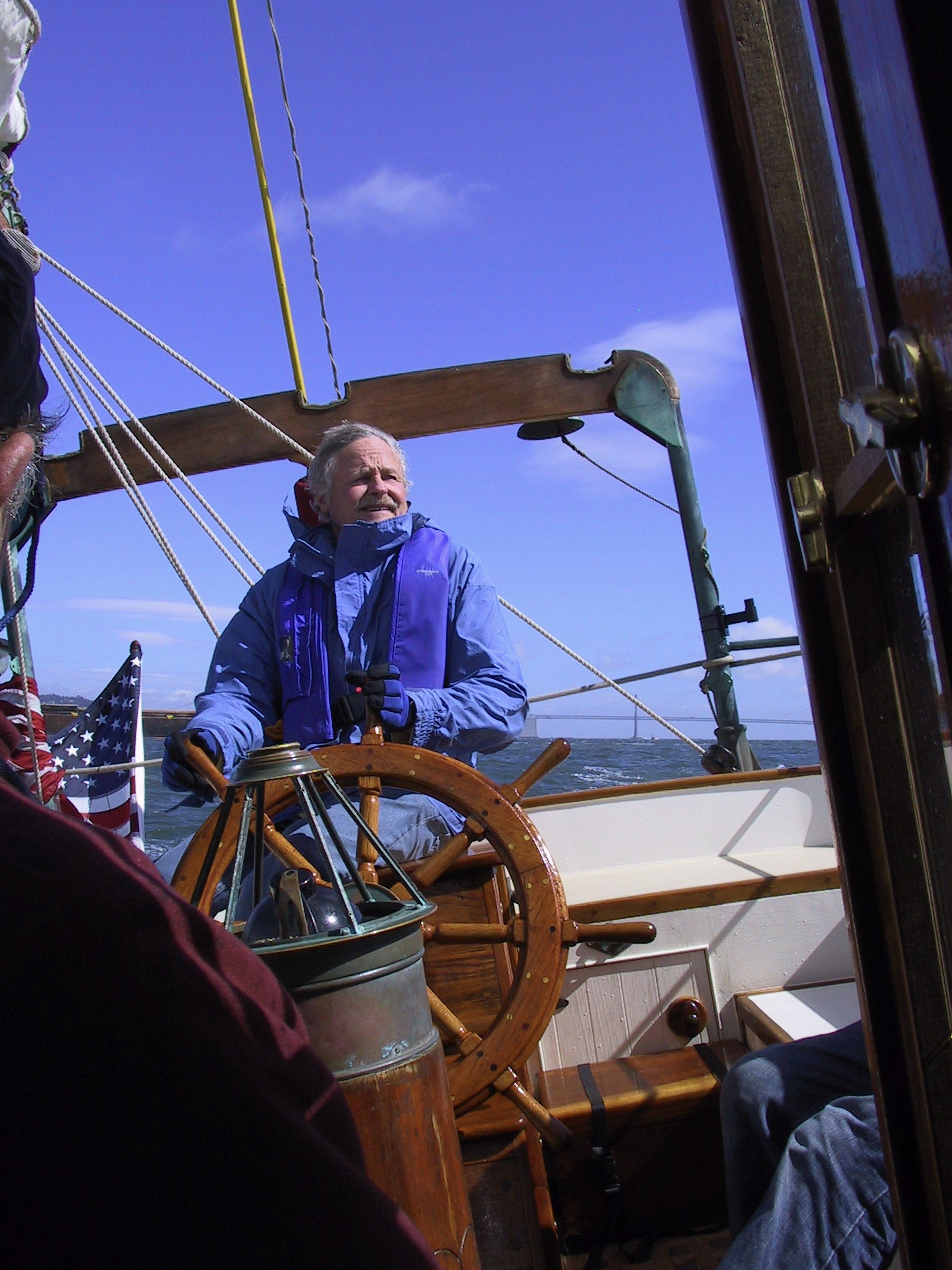 Jim Allen at the helm of the schooner Mahdee, formerly Privateer when owned by Jim’s father Dave Allen (long time SFYC member}