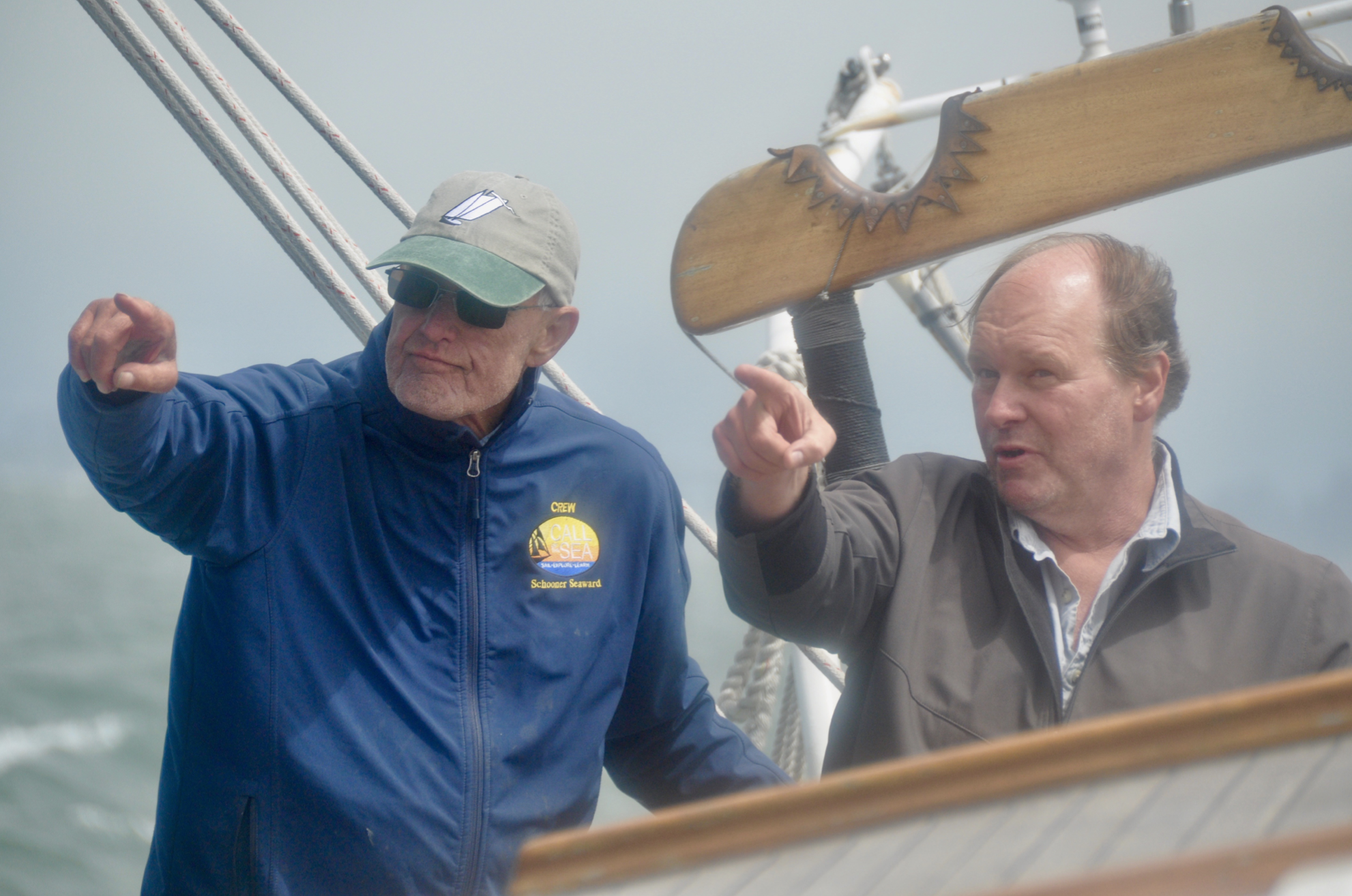 Call of the Sea co-founders Alan Olson and Ken Neal discuss tactics at Seaward’s helm.
© 2019 Latitude 38 Media LLC / Monica