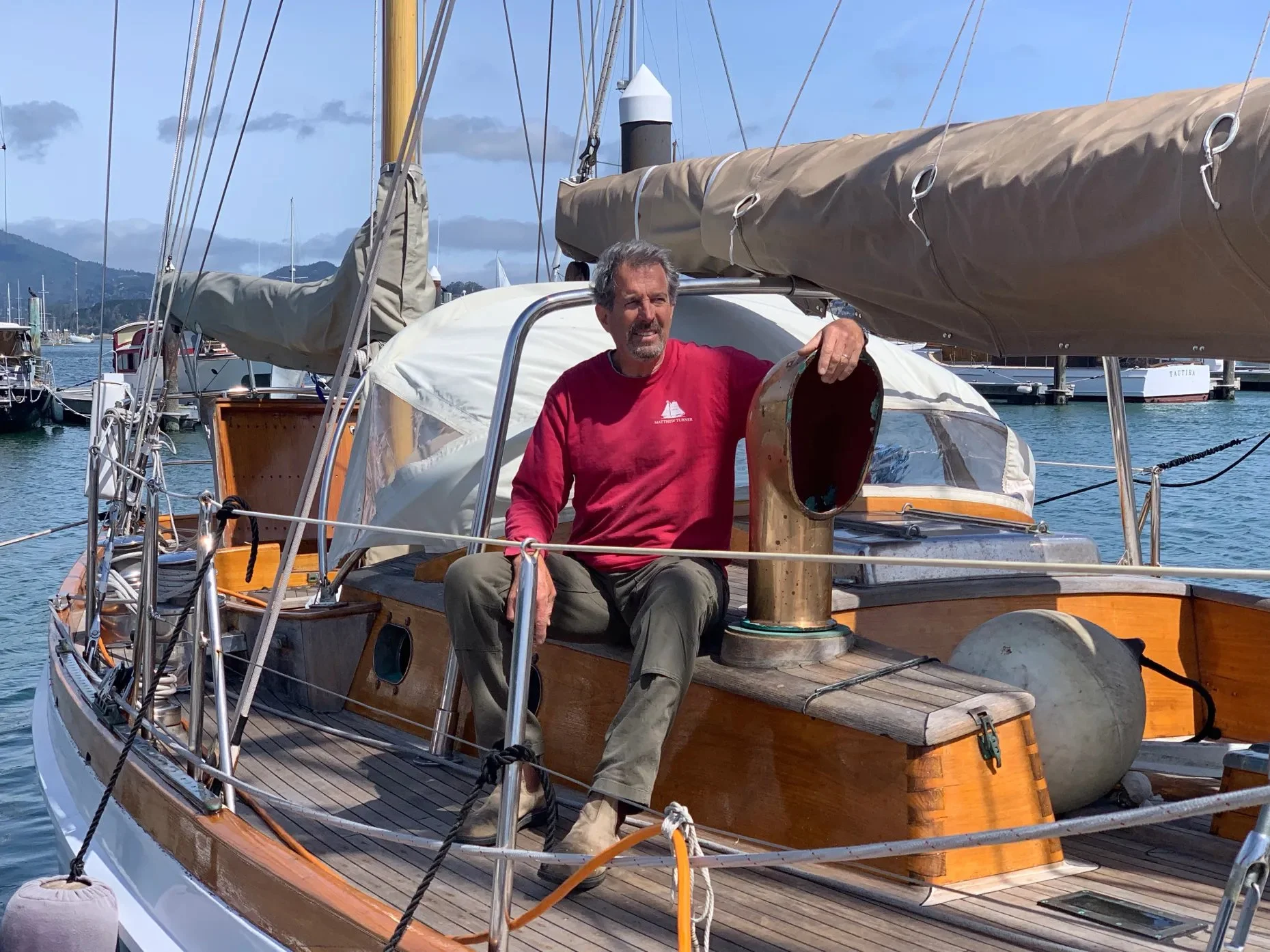 Sausalito's Neil Gibbs, shown taking a break from the restoration work on Kay of Göteborg, will race his boat in the Belvedere Classic Regatta on June 11, 2022. (Courtesy of Neil Gibbs)