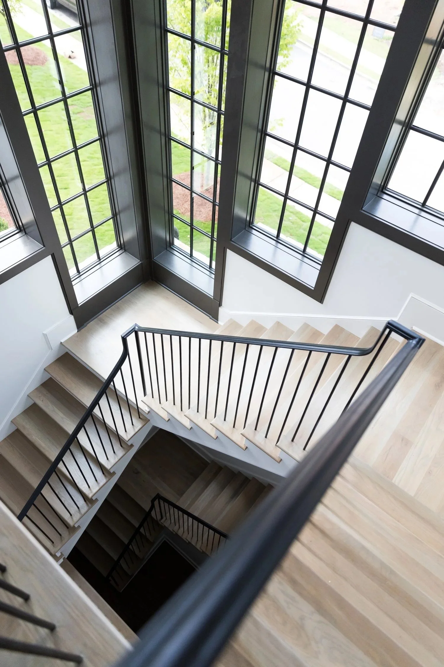 custom staircase, custom windows, Built or renovated by Macallan Custom Homes in Atlanta, GA. Custom Home and Renovations Builder