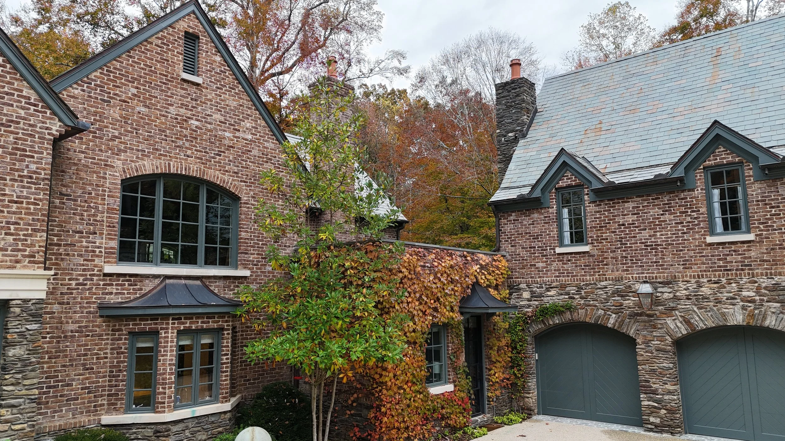 brick exterior, garage whole house renovation Whole house renovation and addition pool, pool house, outdoor living Built or renovated by Macallan Custom Homes in Atlanta, GA. Custom Home and Renovations Builder