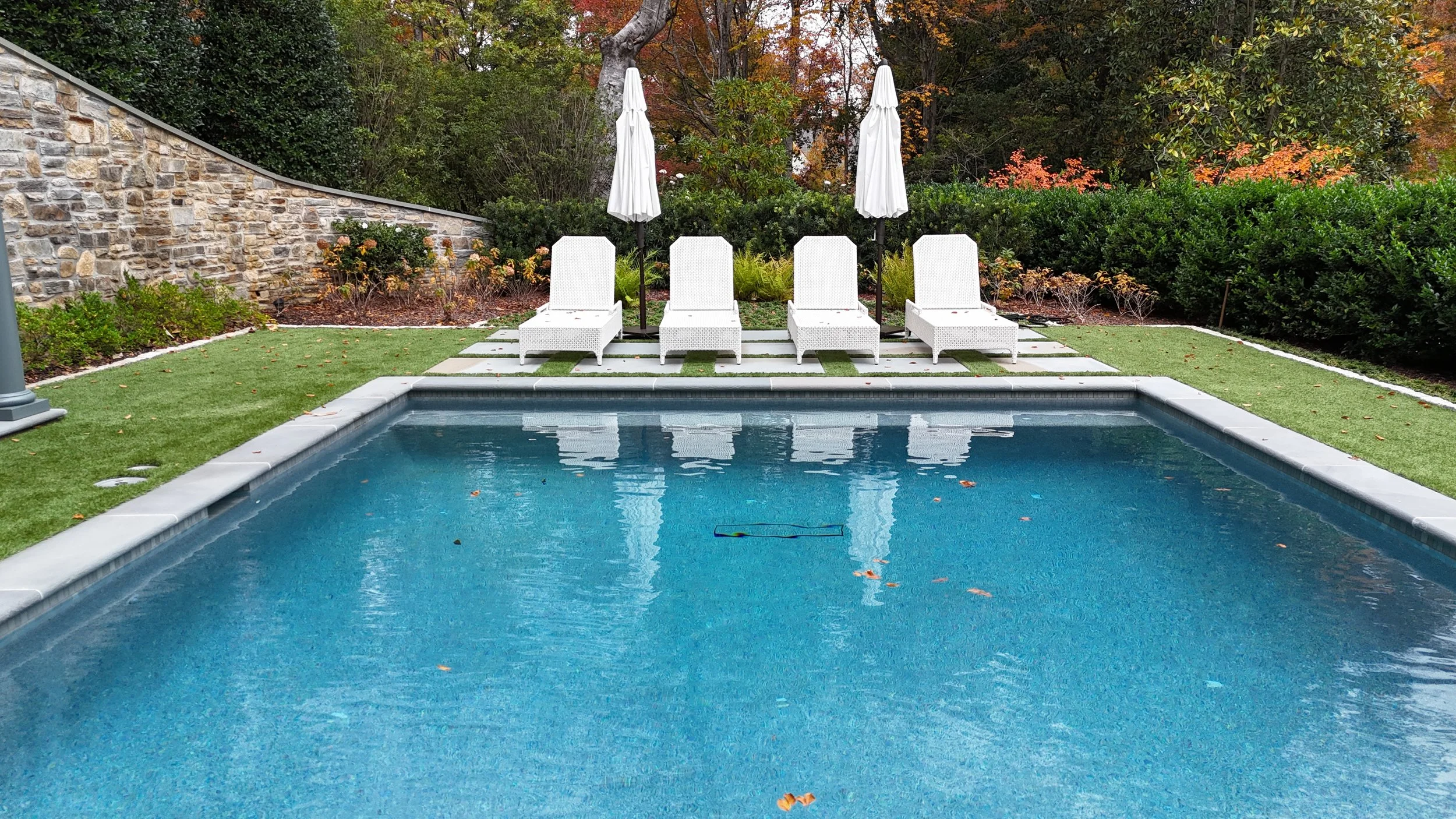 Pool, patio, landscaping, outdoor living whole house renovation Whole house renovation and addition pool, pool house, outdoor living Built or renovated by Macallan Custom Homes in Atlanta, GA. Custom Home and Renovations Builder