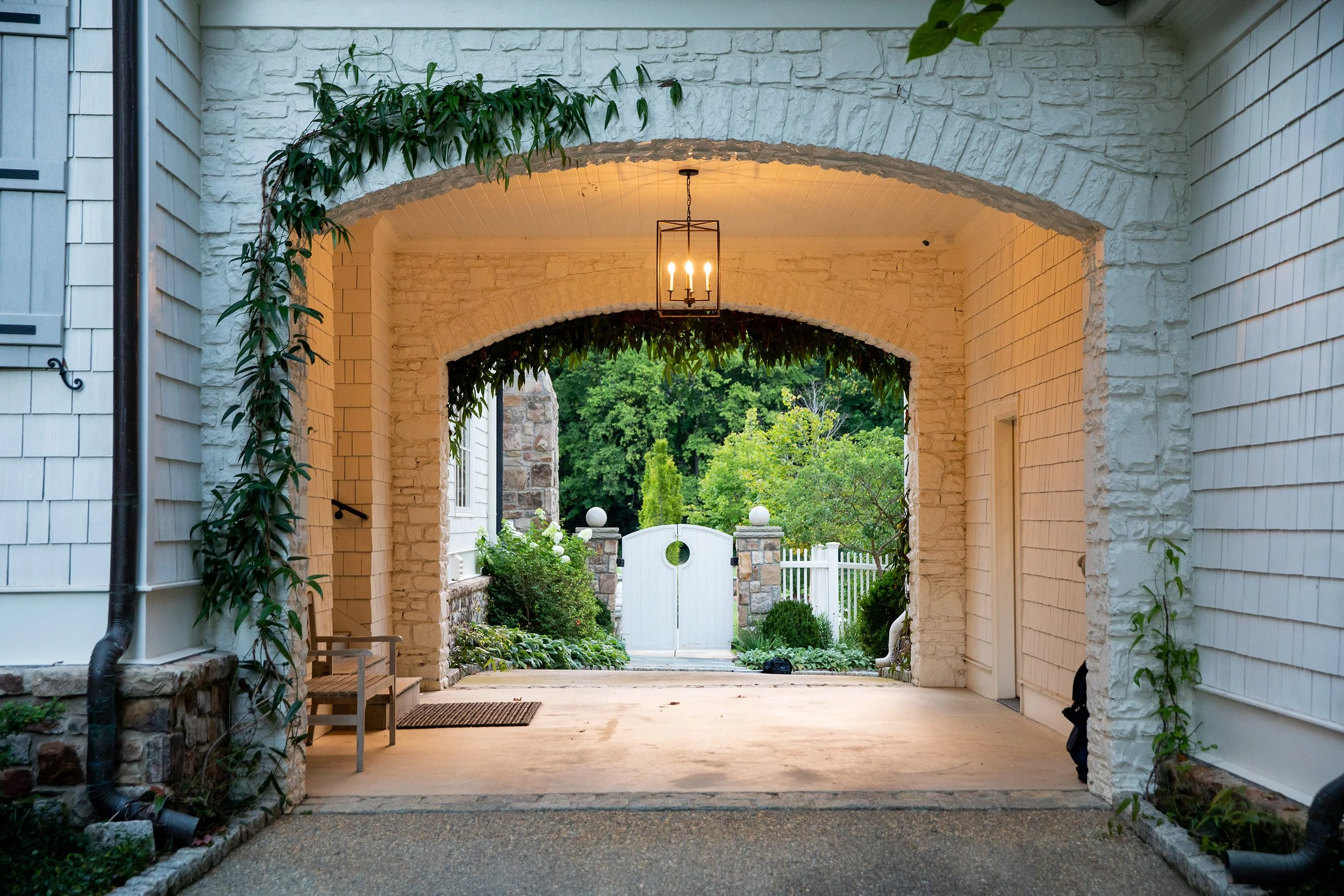 Porte Cochere, garage, landscaping, exterior of house Whole house renovation and addition pool, pool house, outdoor living Built or renovated by Macallan Custom Homes in Atlanta, GA. Custom Home and Renovations Builder
