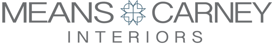 Logo of Means Carney Interiors with text and a decorative emblem in the center.