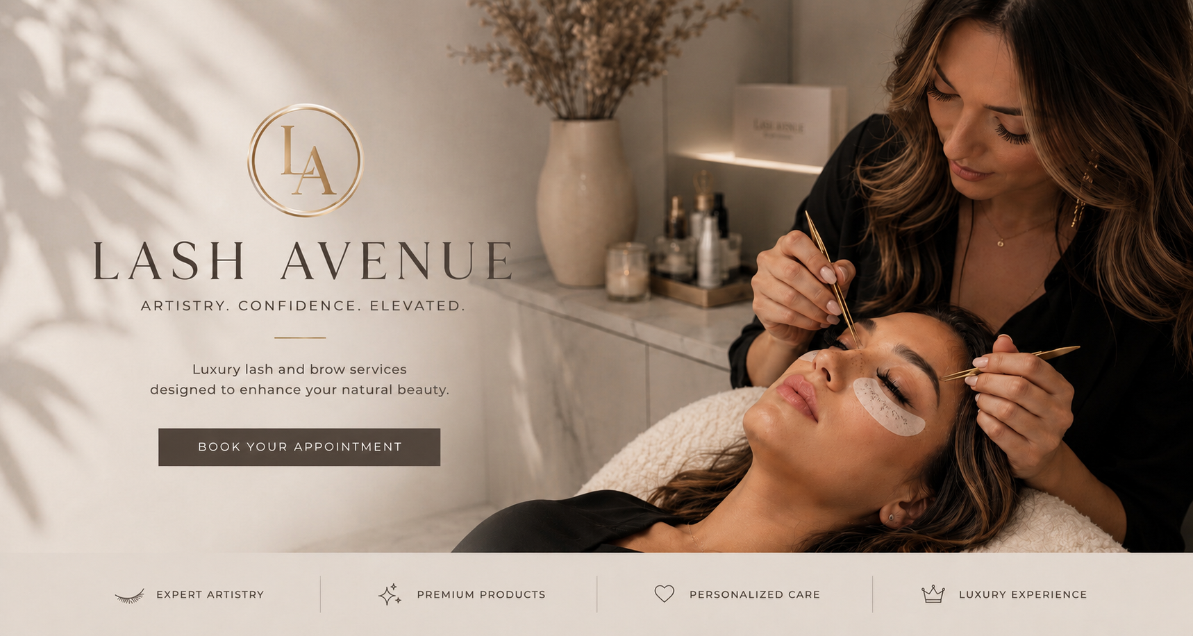 A woman is lying down with her eyes closed as a beautician applies eyelash extensions with tweezers. The setting is a luxurious salon with neutral tones, a large vase with dried flowers, and beauty products on the counter.