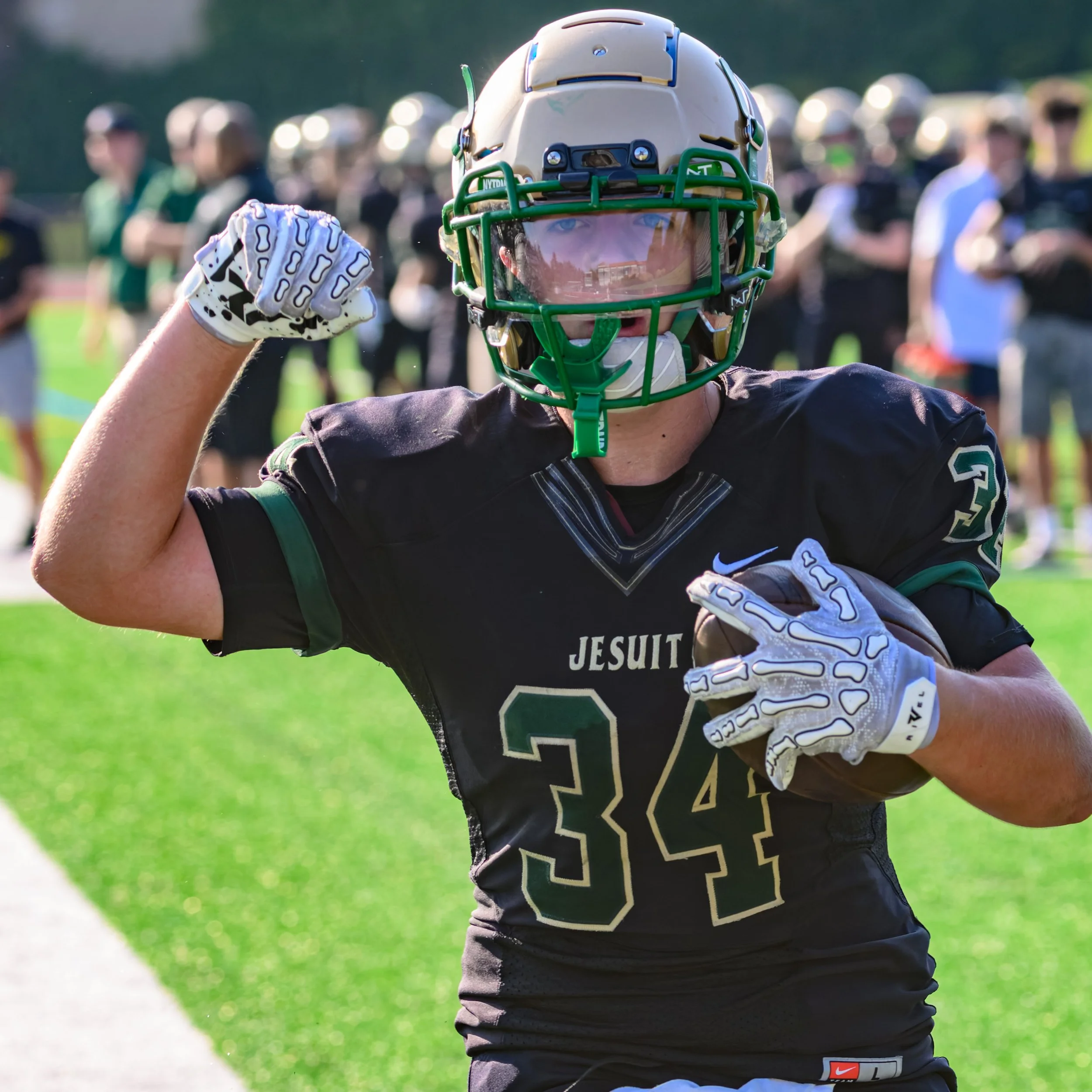 Jesuit freshman football player celebrating during game action in Portland Oregon