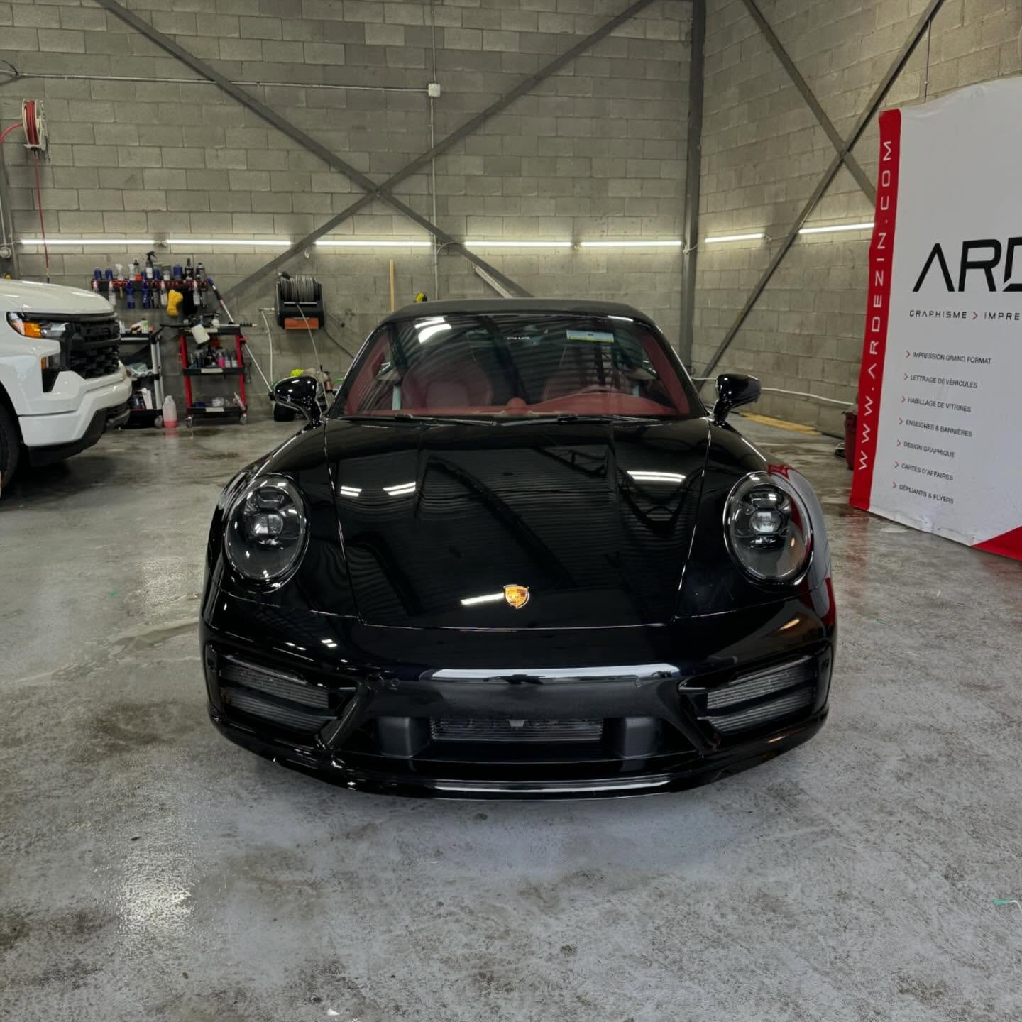 2023 911 Carrera S. Client purchased the vehicle with a satin black wrap. We removed the wrap and installed a front end PPF kit #ppf #ppfprotection #ppffilm #xpel #suntek #detailing #3m