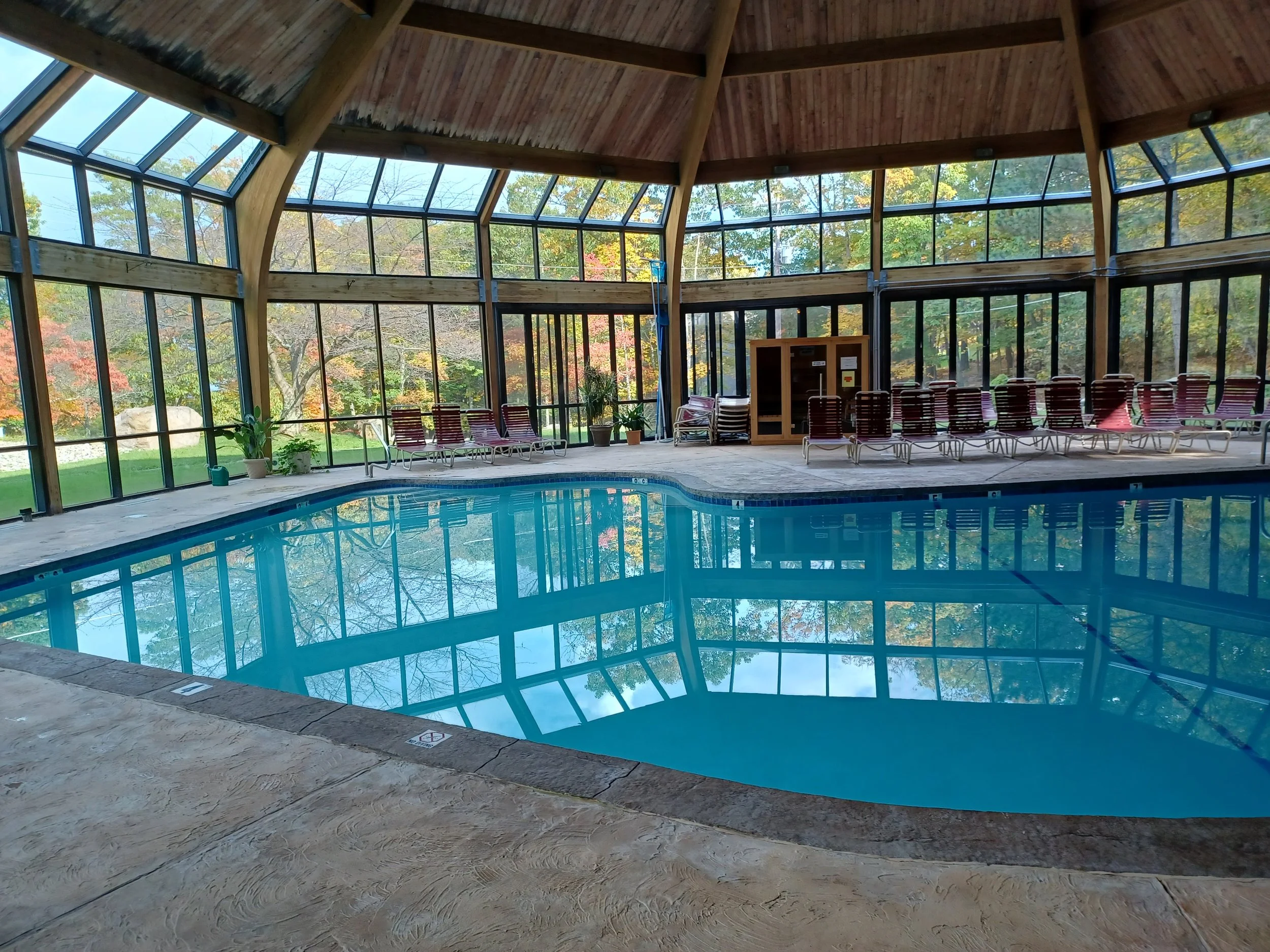Splash in the pool after a day of hiking when you stay at Stay For Vacay's Ski Lift Summer Drift vacation home in the Poconos