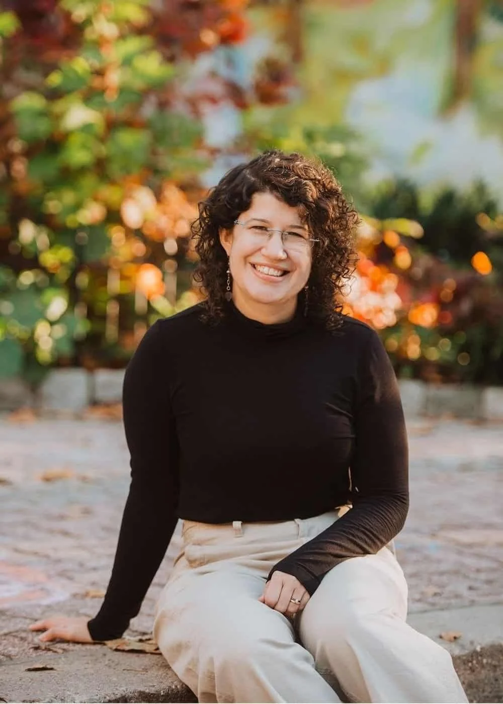 A picture of Christine Ruberti-Bruning, a queer therapist who specializes in support for partners of transgender spouses and partners in Philadelphia, PA.