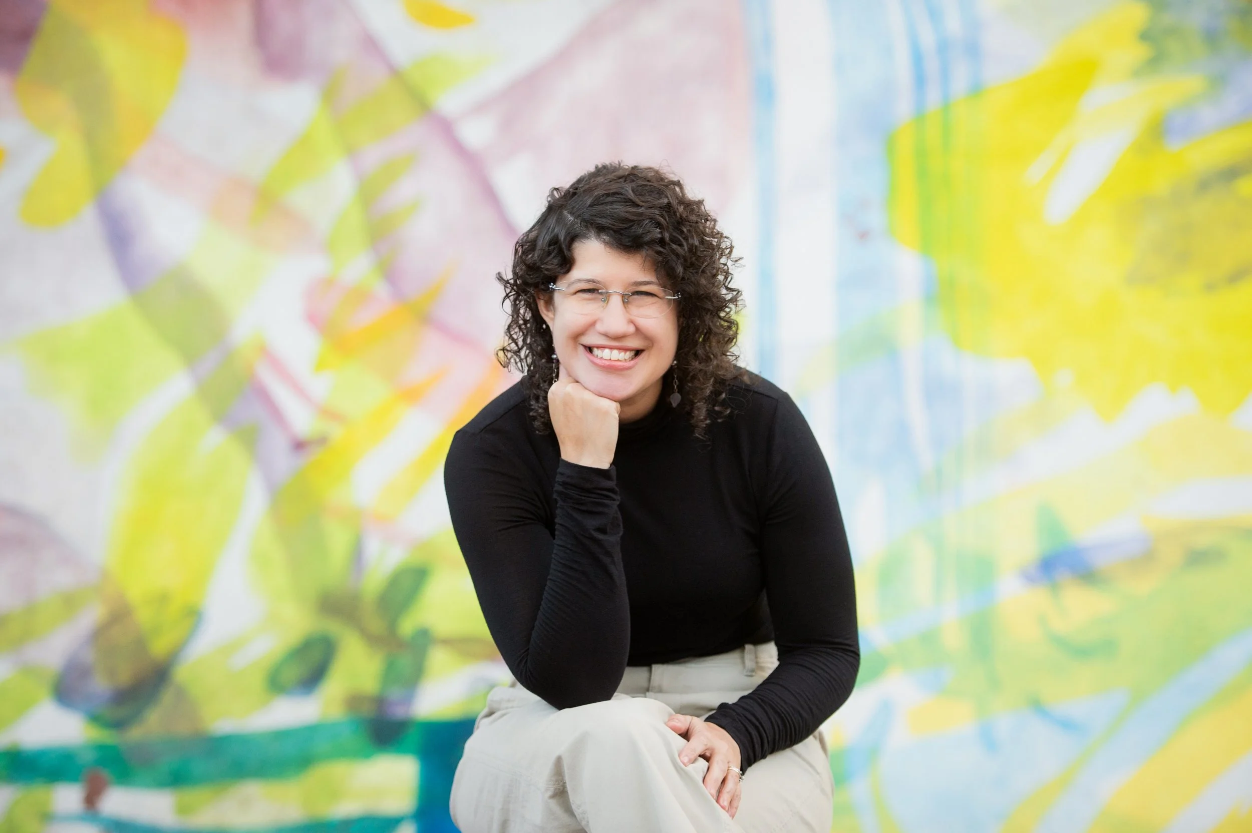 A picture of Christine Ruberi-Bruning ATR-BC, CEDS, LPC, a queer licensed therapist who specializes in LGBTQ and transgender affirming care in Philadelphia, PA.