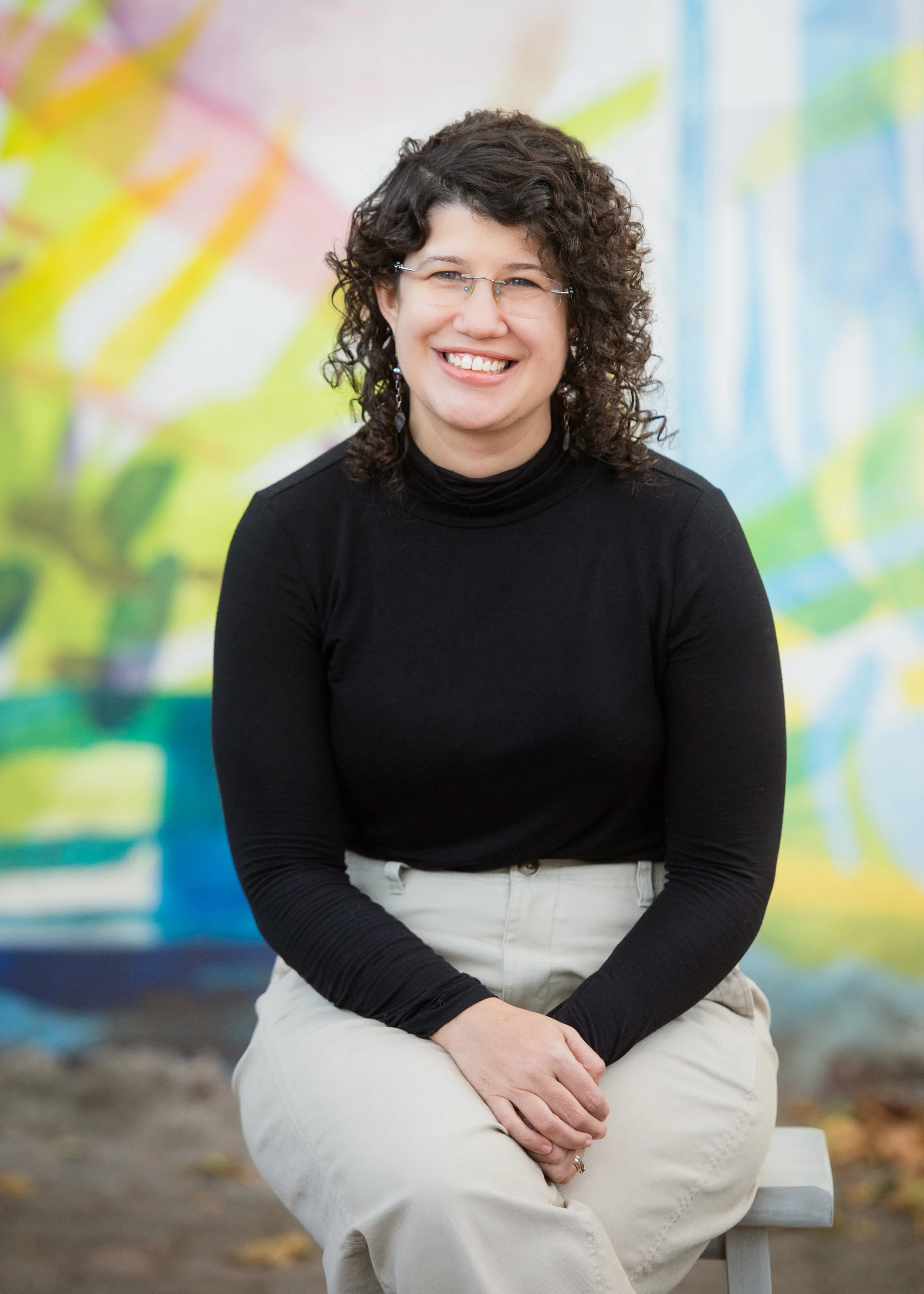 A picture of Christine Ruberti-Bruning, a queer licensed art therapist who specializes in therapy for queer and trans teens in Philadelphia, PA.