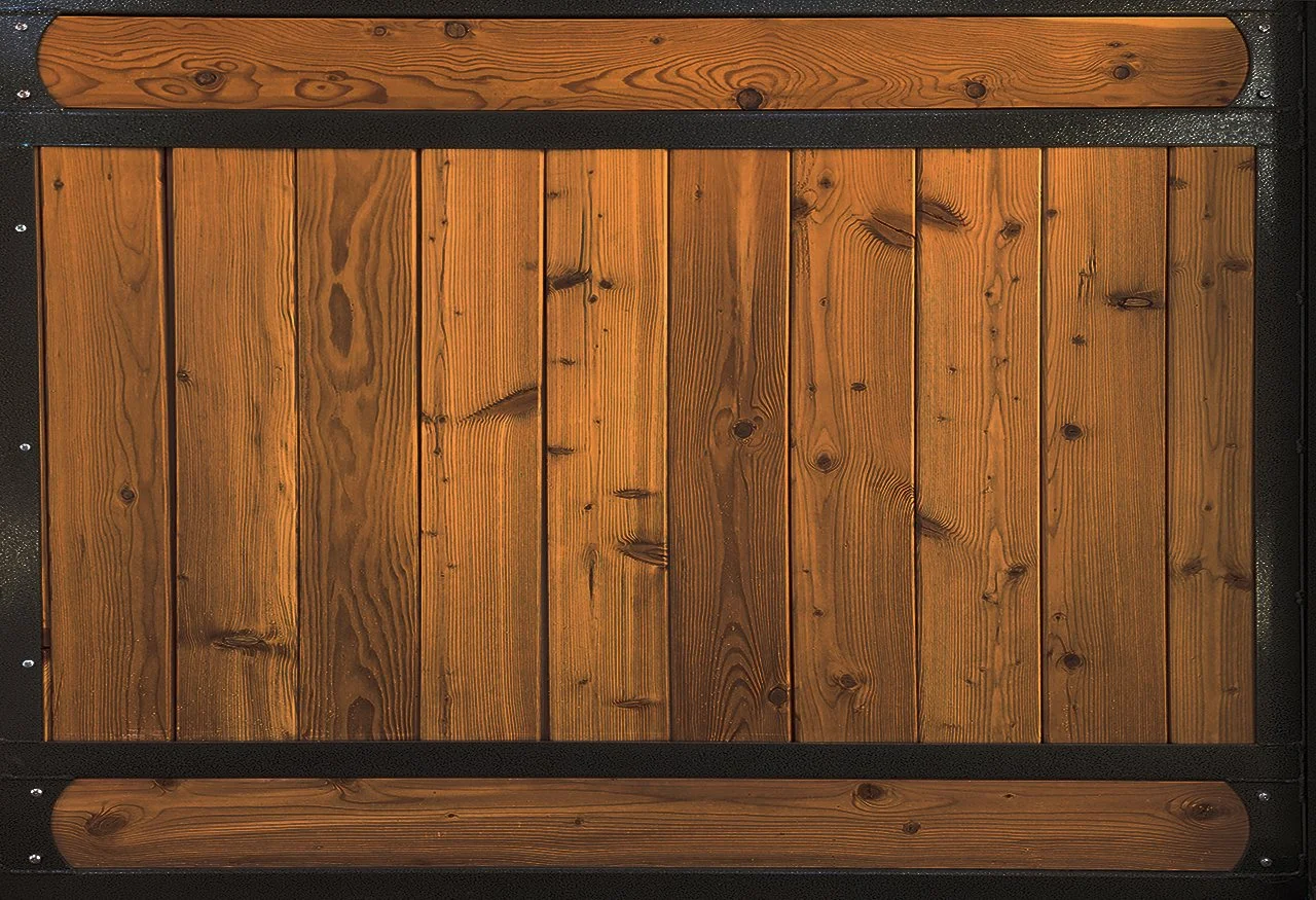 A wooden bench with a backrest, featuring vertical planks of polished wood and black metal framing.