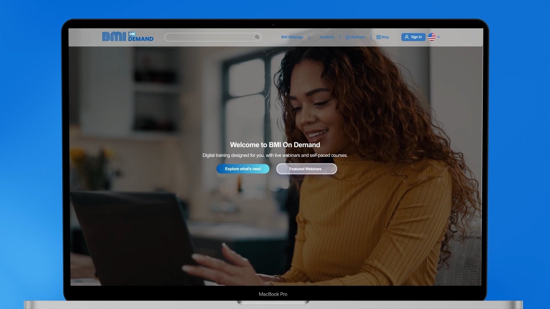 Pantalla de una página web llamada BMI On Demand en una computadora portátil MacBook Pro, mostrando una mujer sonriendo y usando una tableta en un espacio con ventanas y luz natural.