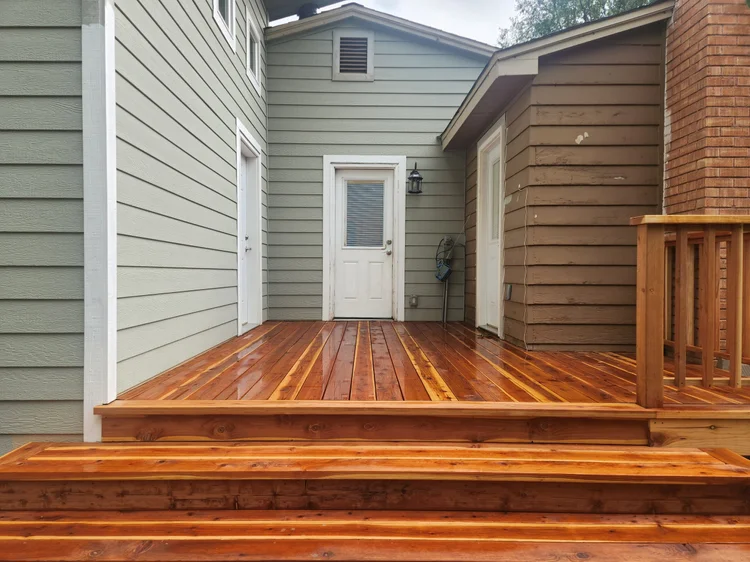 New deck connecting family room and bedroom addition
