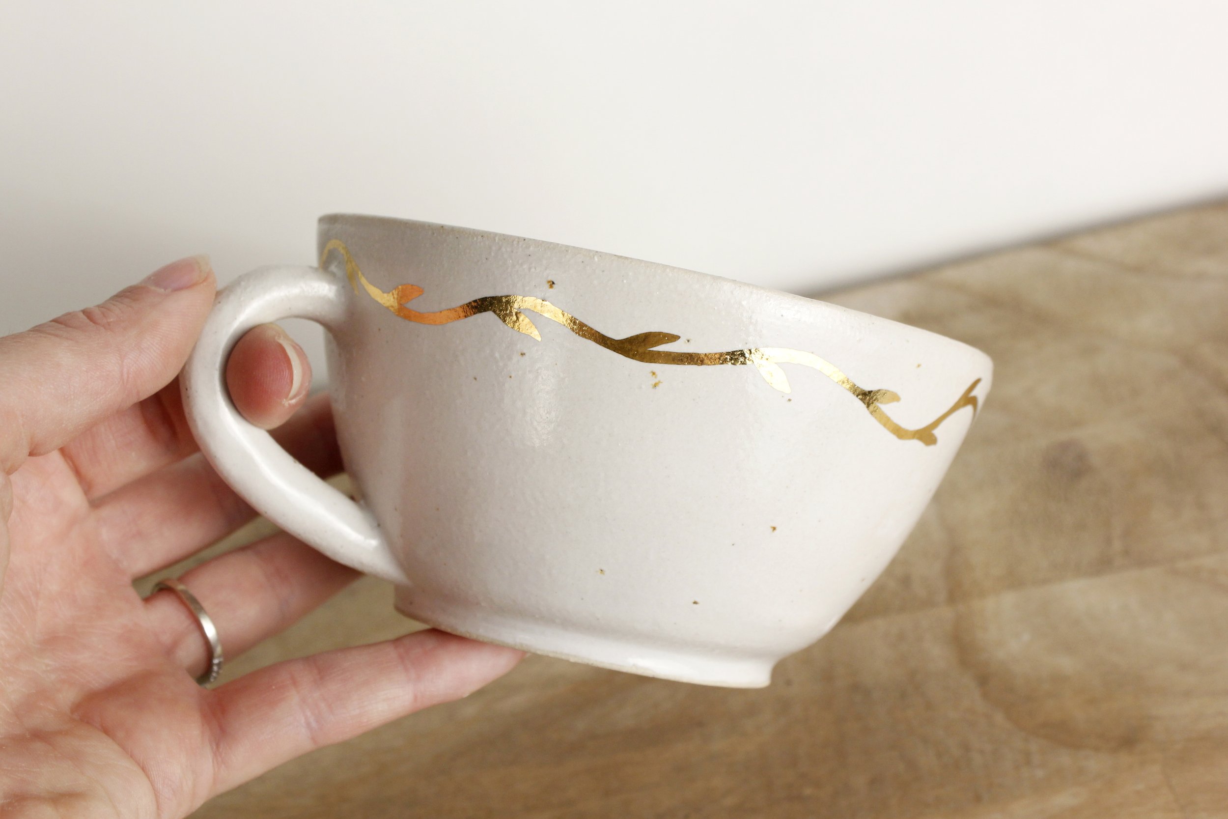 White Stoneware Tea Cup