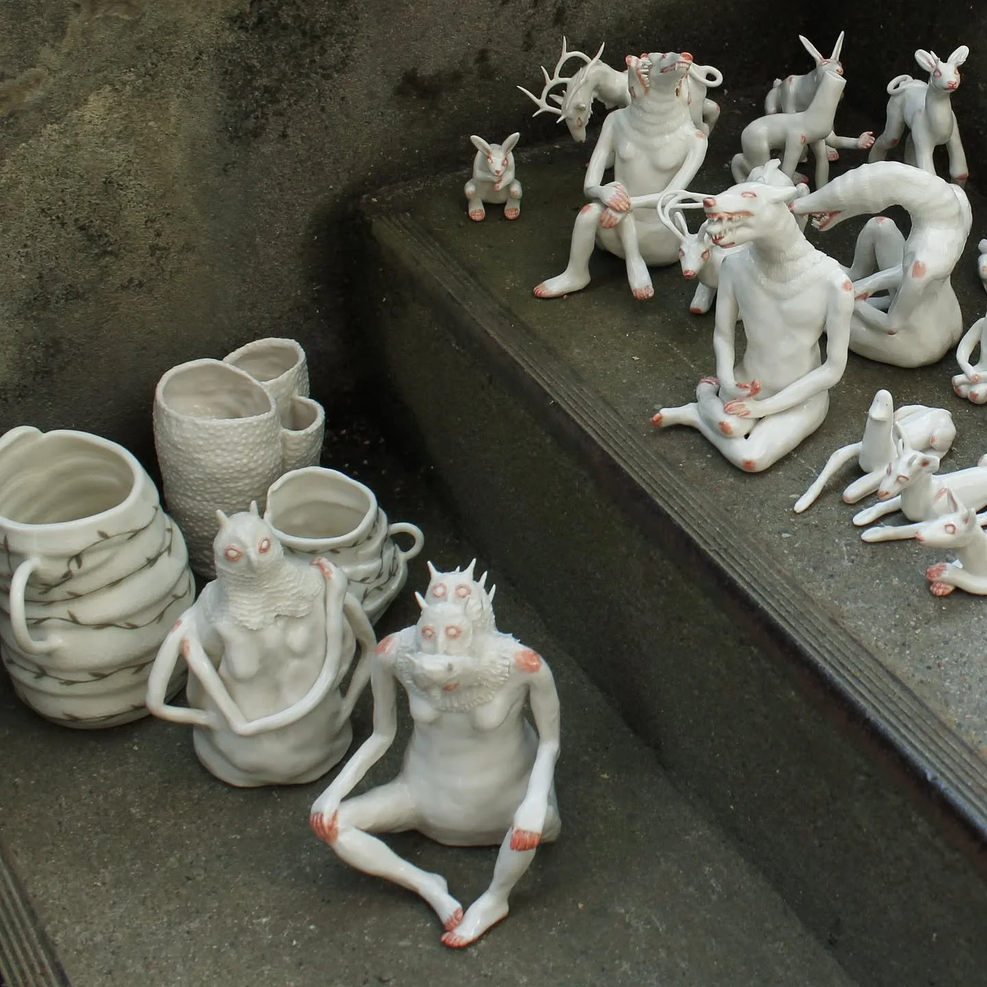 Just sculptures on stairs,
waiting to be able to fire something new