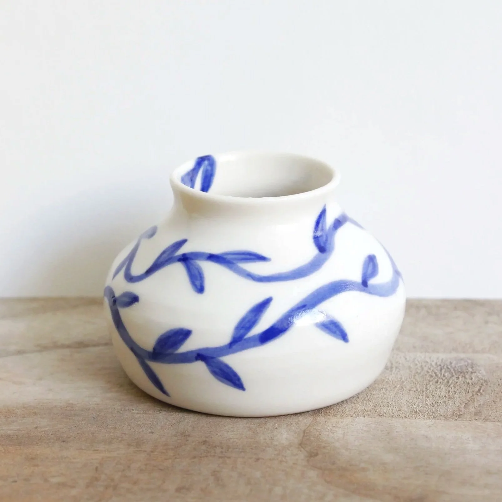 Porcelain mini vase with blue vines