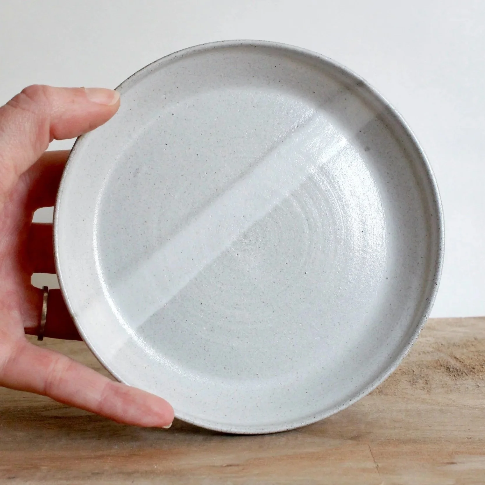 Stoneware plate in white on white, 13,5 cm