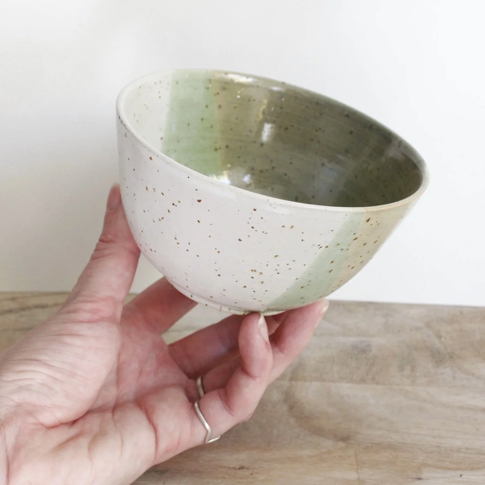 Stoneware bowl, green on white