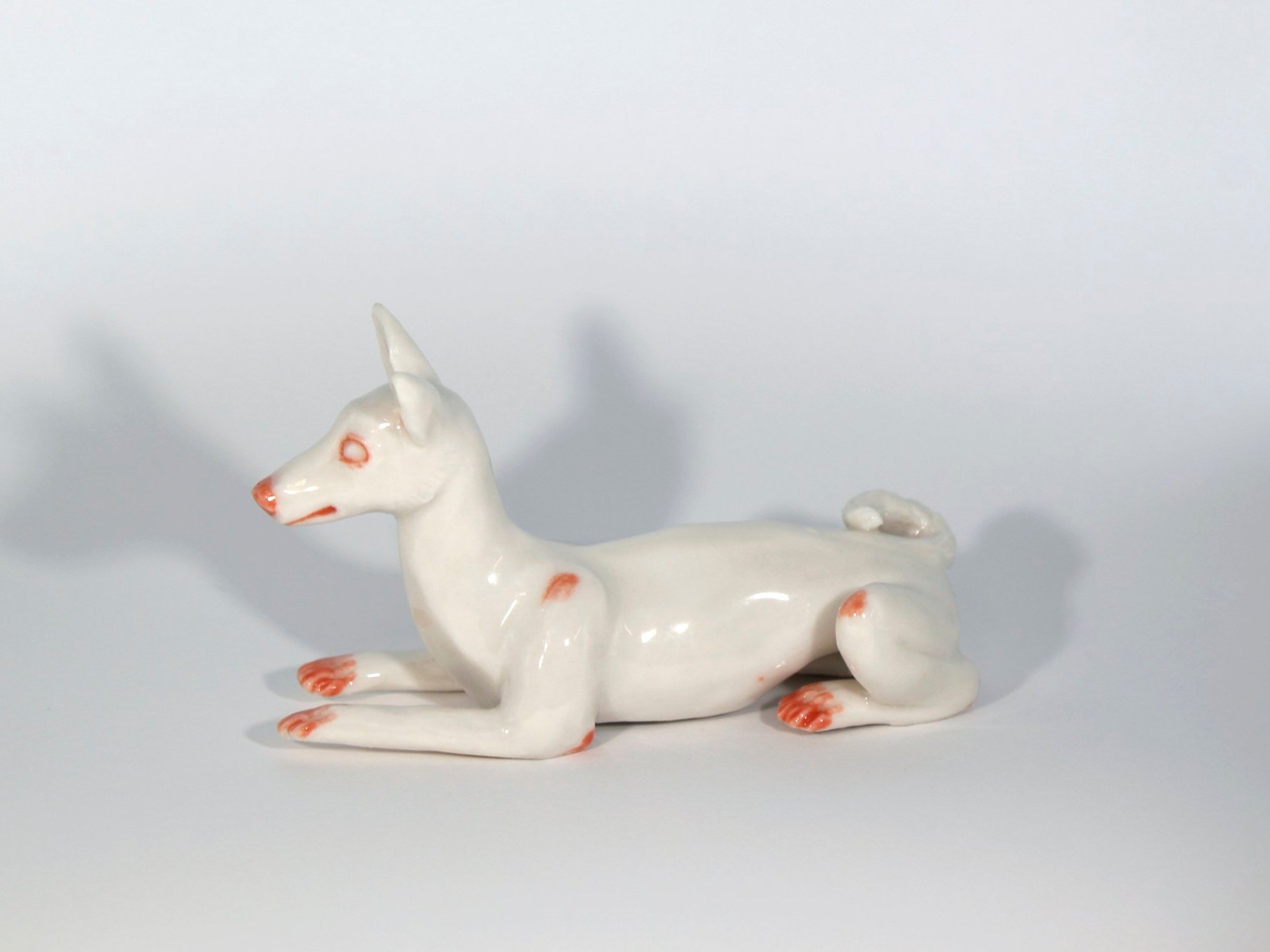 Little porcelain dog