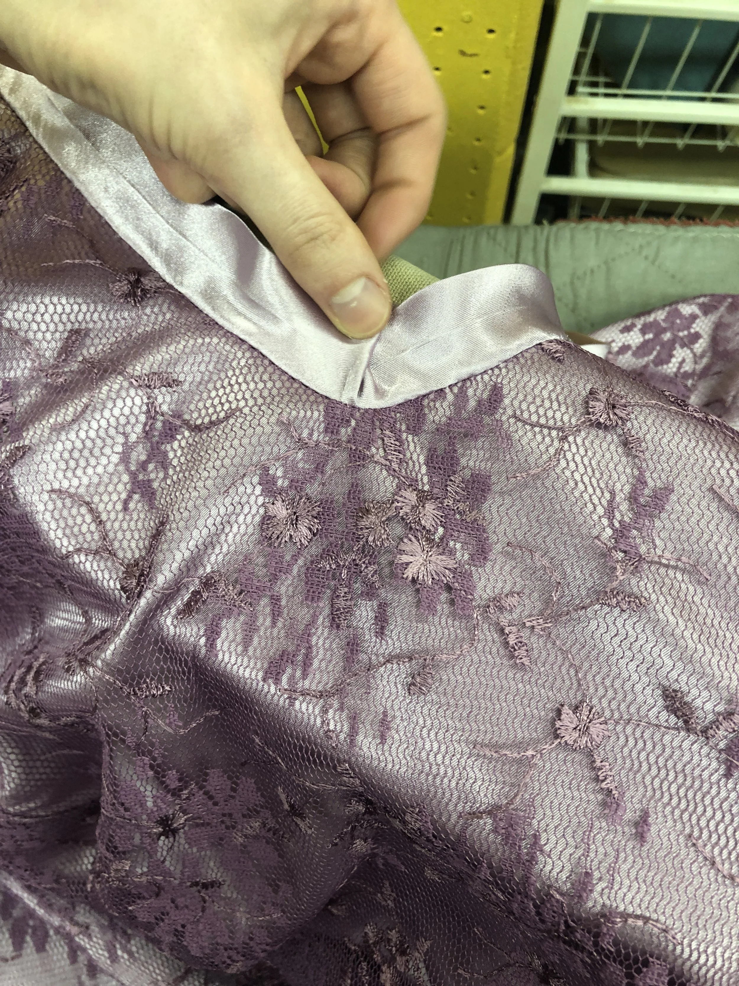 Pressing the V-neck facing at the point