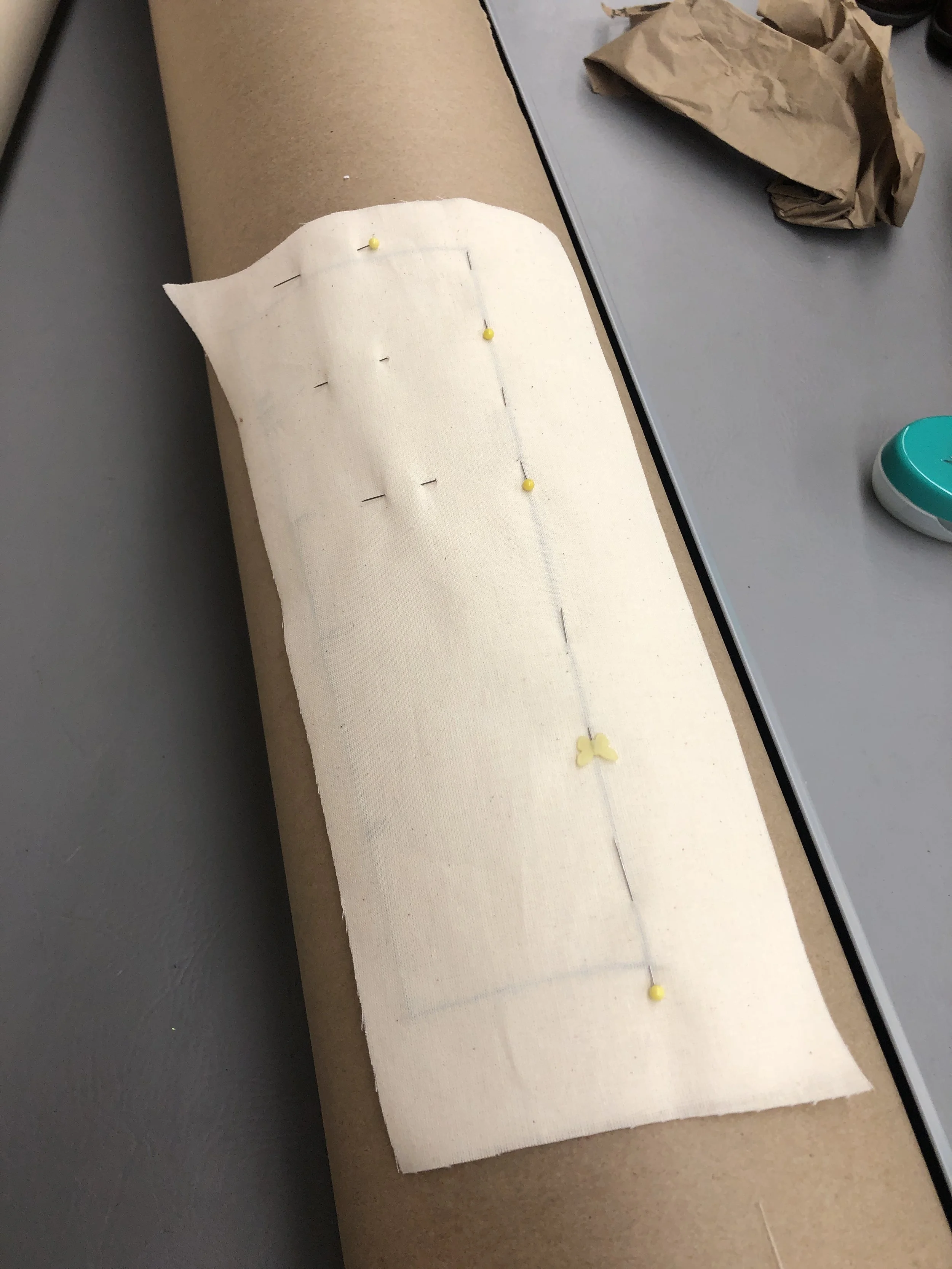 Flat lining the "fashion fabric" [it's muslin] to baby flannel, over a curved surface