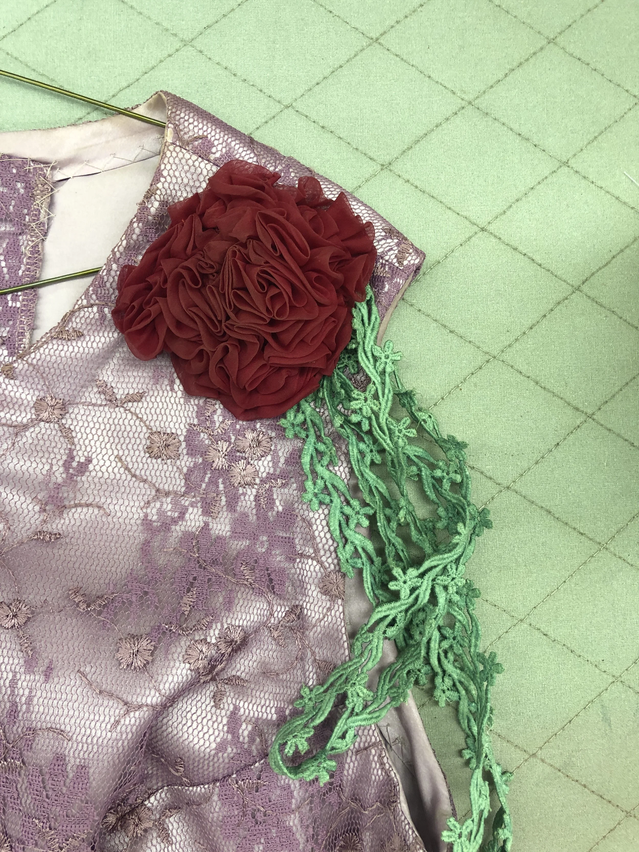 Flower and trim at shoulder