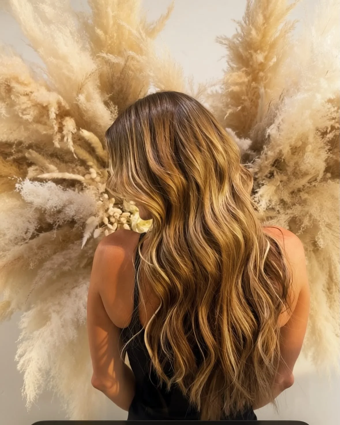 There is so much detail placed into a keratin install. Every bond is placed based on a clients specific hair growth , color , and texture .  Sometimes this changes multiple times on one client .  Here, we really prioritized maintaining a very sun-kis