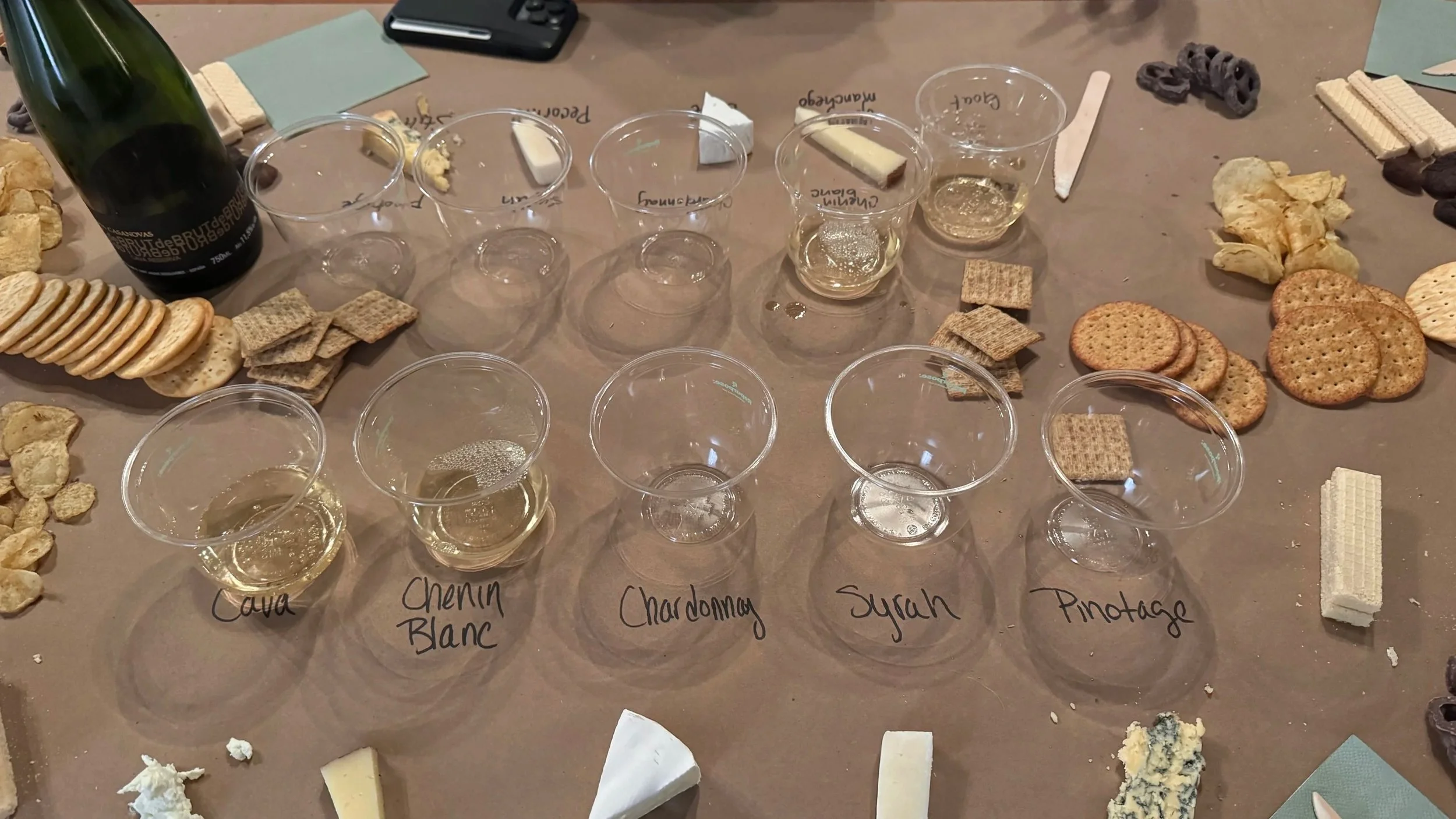 in-home wine tasting setup with wine and charcuterie