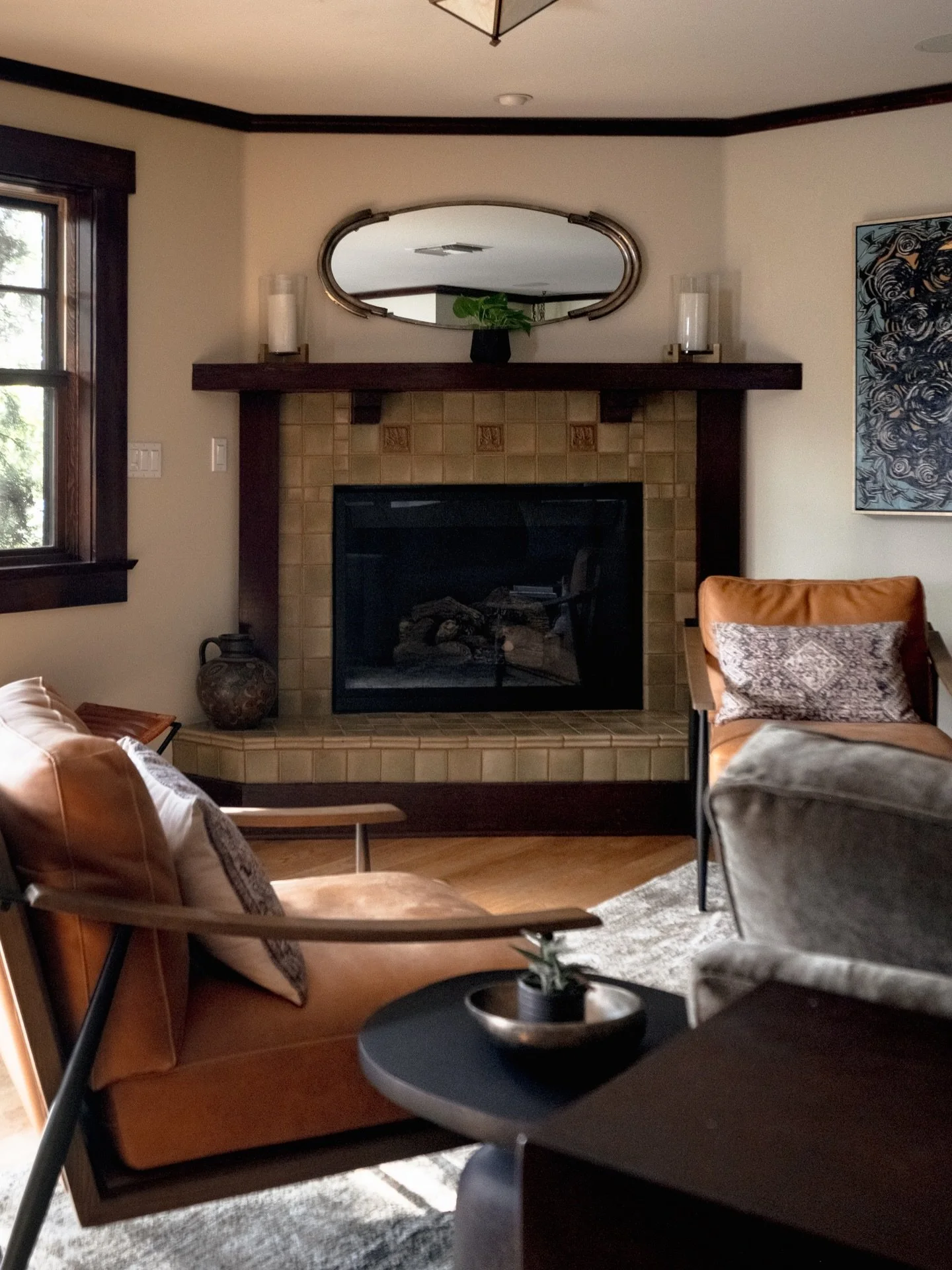 The fireplace at our Altadena project became the quiet anchor of the room.

This fireplace already held history, so the design focused on honoring what was there rather than competing with it. The warm tile surround, deep wood mantel, and gentle symm