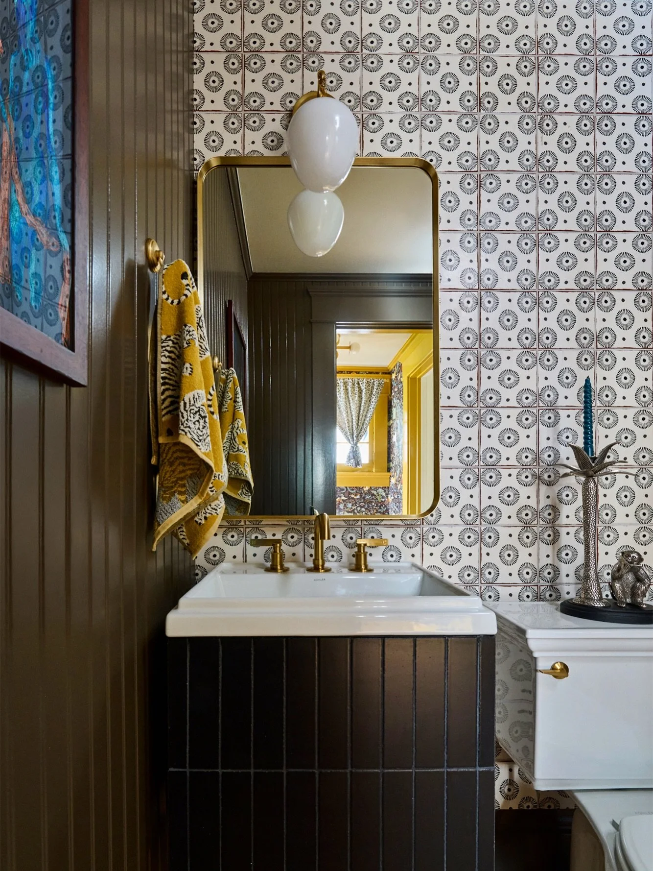 The vestibule and powder room are the kind of spaces that reward the curious. Tucked away at the back of the Baldwin Oaks Estate, they might be easy to overlook but impossible to ignore once you find them.

I wanted this powder room to feel like a di