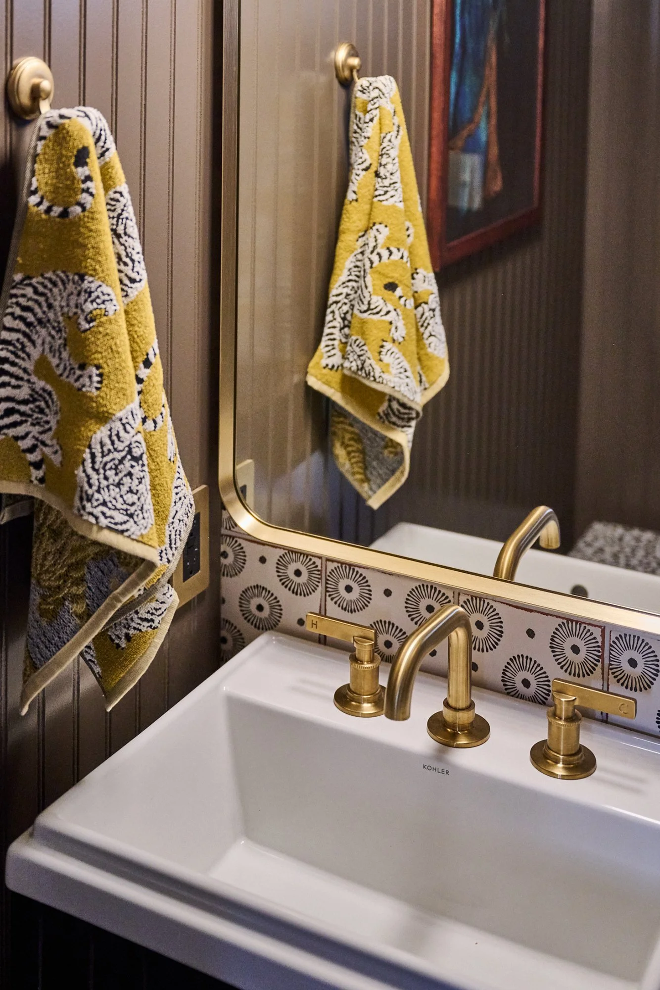 Kohler Brass faucet, Sink, Tiger towel, Half Bath