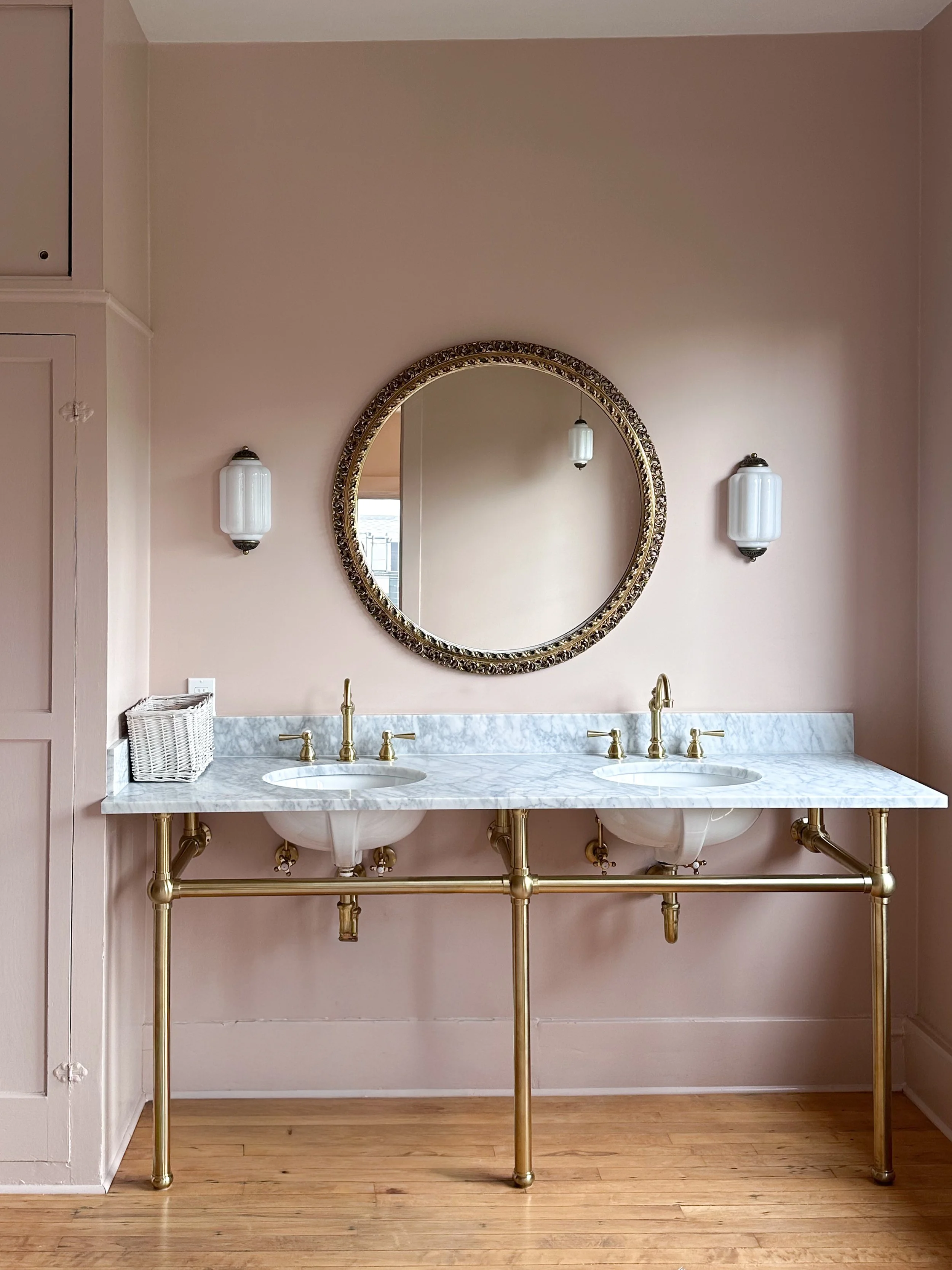 Pink women's bathroom, South Pasadena, Brass, white sink, gold mirror