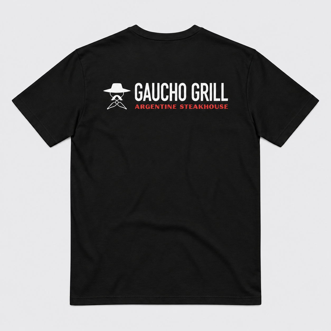 Camiseta negra con logo Gaucho Grill.png