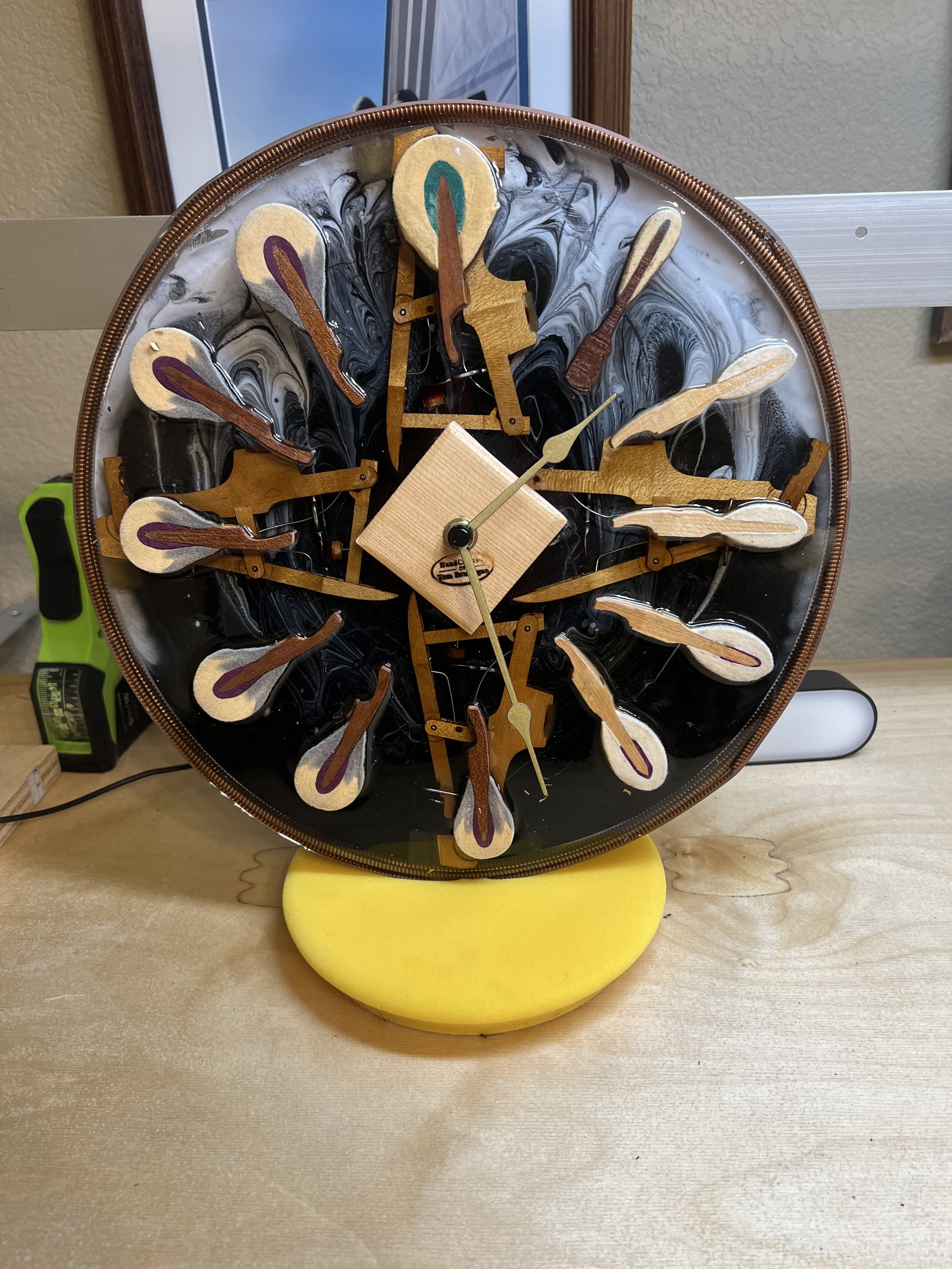 For those time conscious technicians, there's nothing like a clock - graduated hammer sizes and a piece of soundboard in the middle.