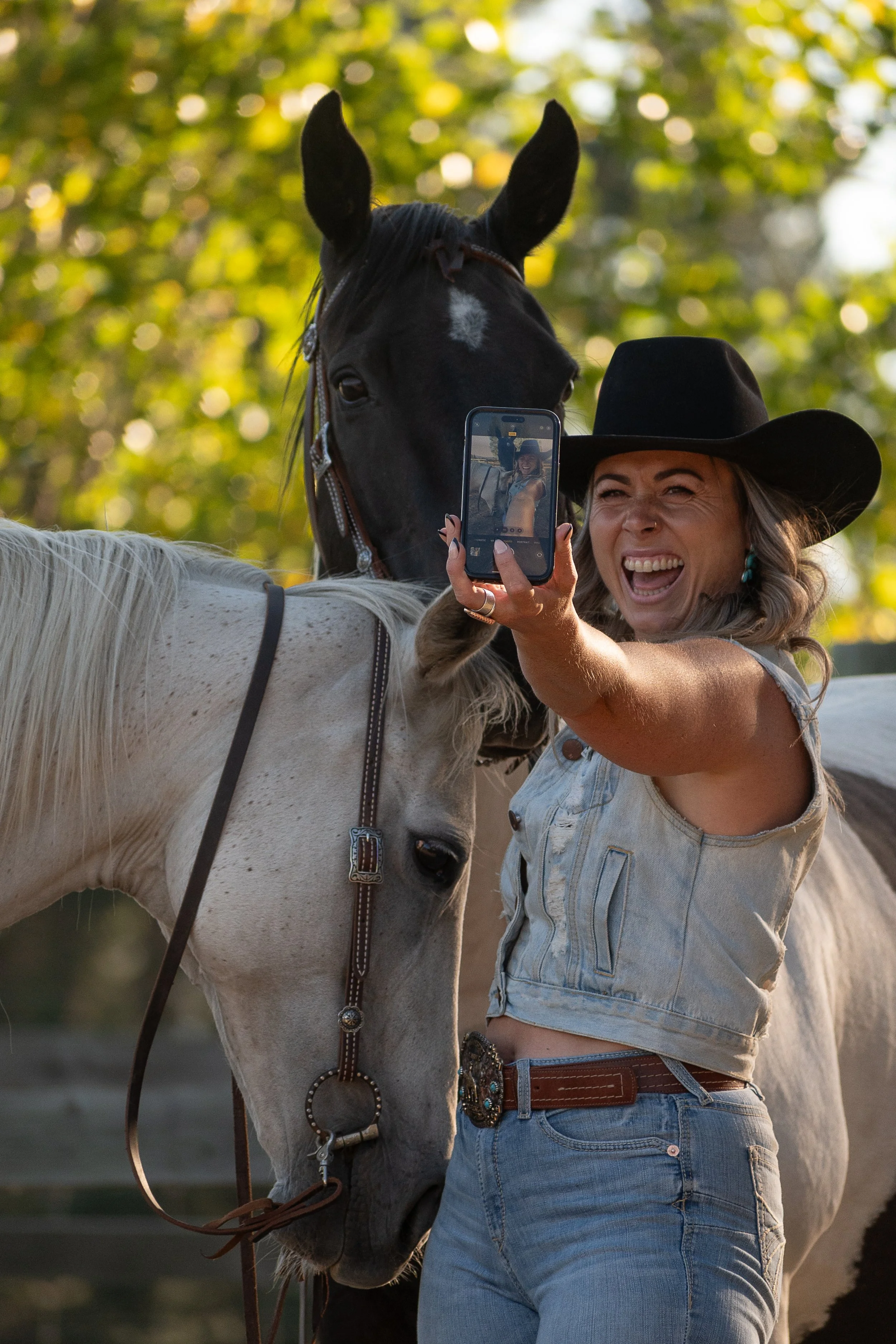 krista-grant-selfie-with-horses-cowboy-hat-marketing-consultant-nz