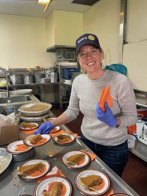 Rotarian serving Thanksgiving Meal to Canyon Hills School students. Canyon Hills serves students ages 10-22 who have moderate to severe disabilities. 
