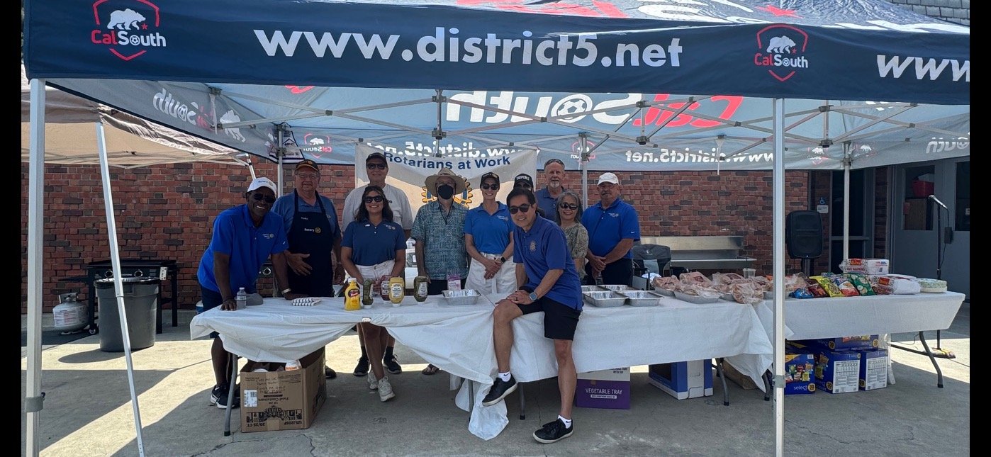 Rotarians providing lunch for the annual TOPSoccer event - a day of sports for children and adults with intellectual, emotional or physical disabilities. 