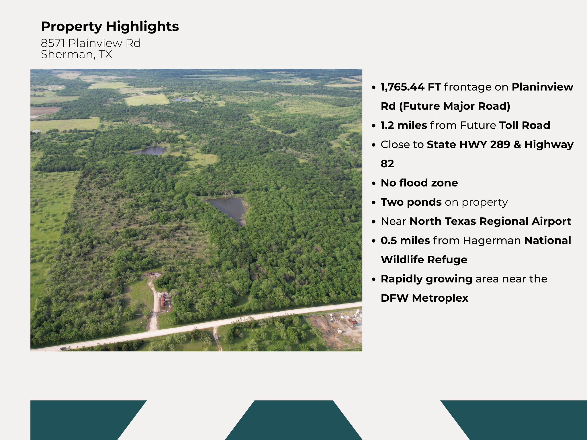 Aerial view of a property with wooded areas, two ponds, and some open land, with a road running along its border.