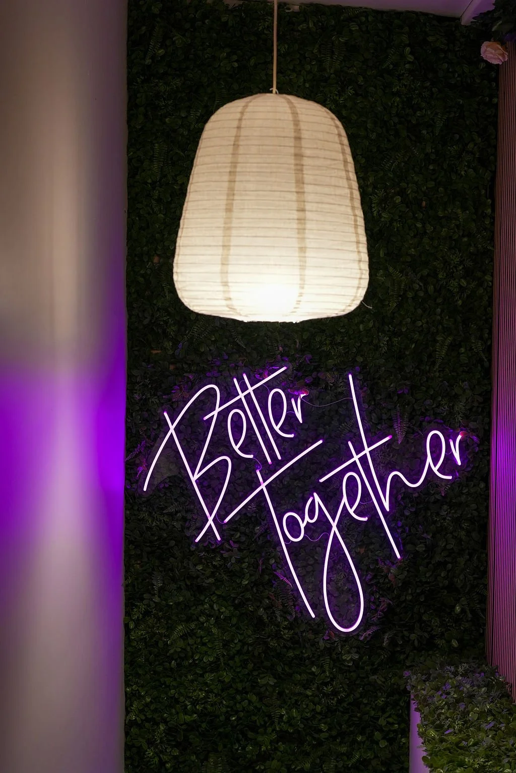 Flourish Collective hallway with 'better together' in lights.