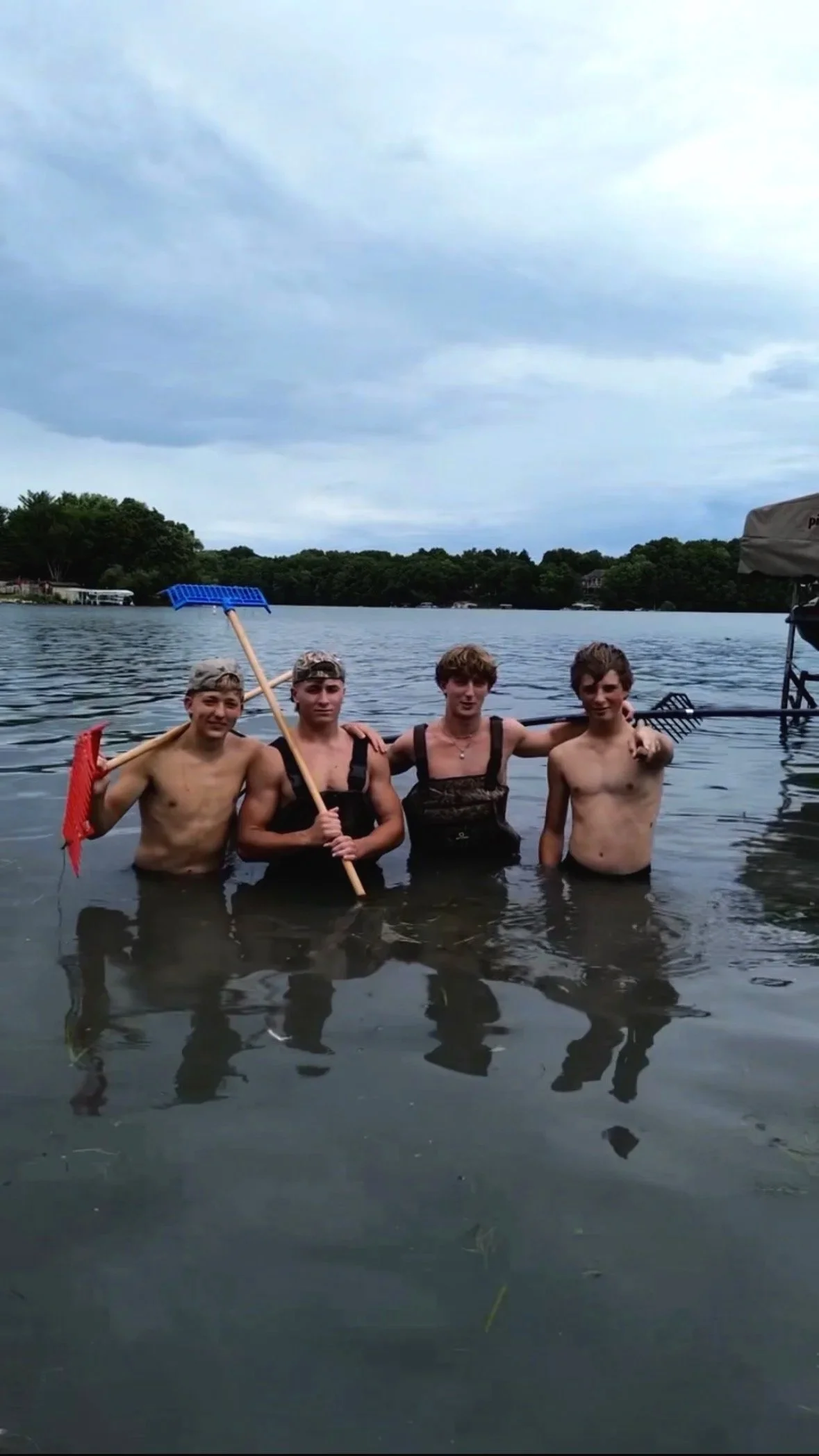 Seaweed Solutions crew cleaning a Wisconsin lakefront shoreline