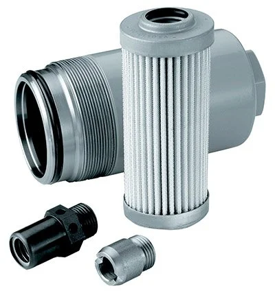Automotive air filter and related components, including a cylindrical filter element and connectors, on a plain background.