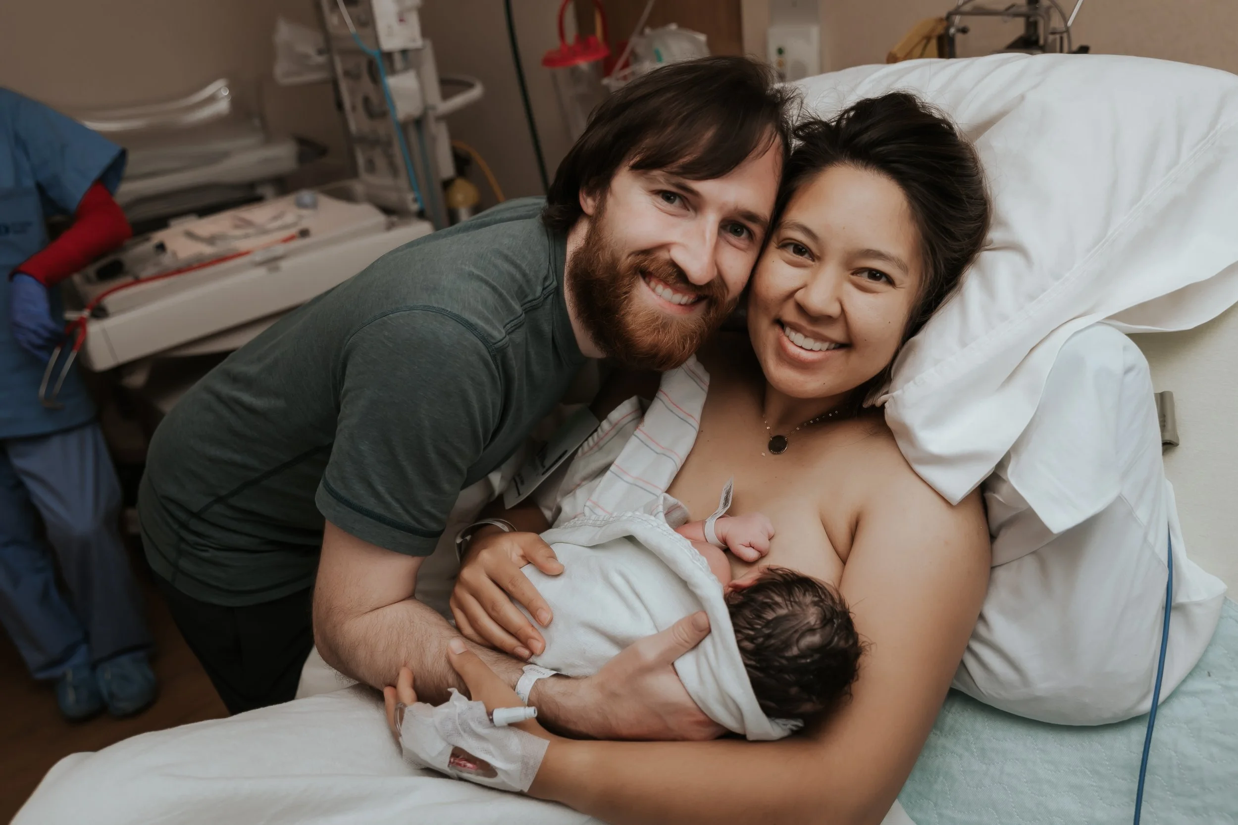 Mom, dad, and baby. First family photo at the hospital taken by Bay Area Birth Photographer, Paige Driscoll. 